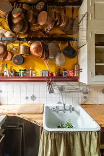 a kitchen with a stove and a sink