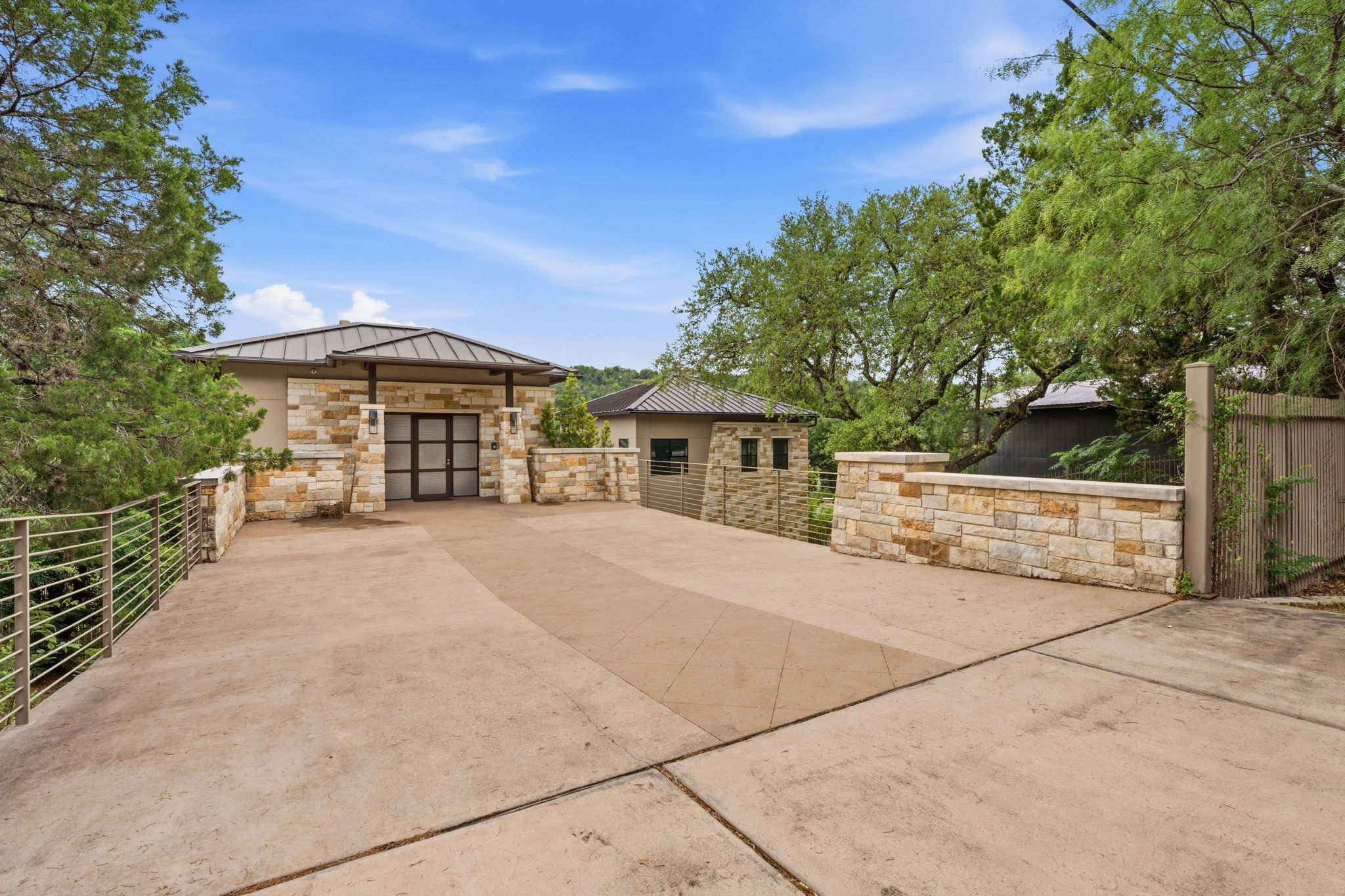 3605 Robbins Road Austin, TX 78730 - Photo 7 of 51 a front view of a house with a yard