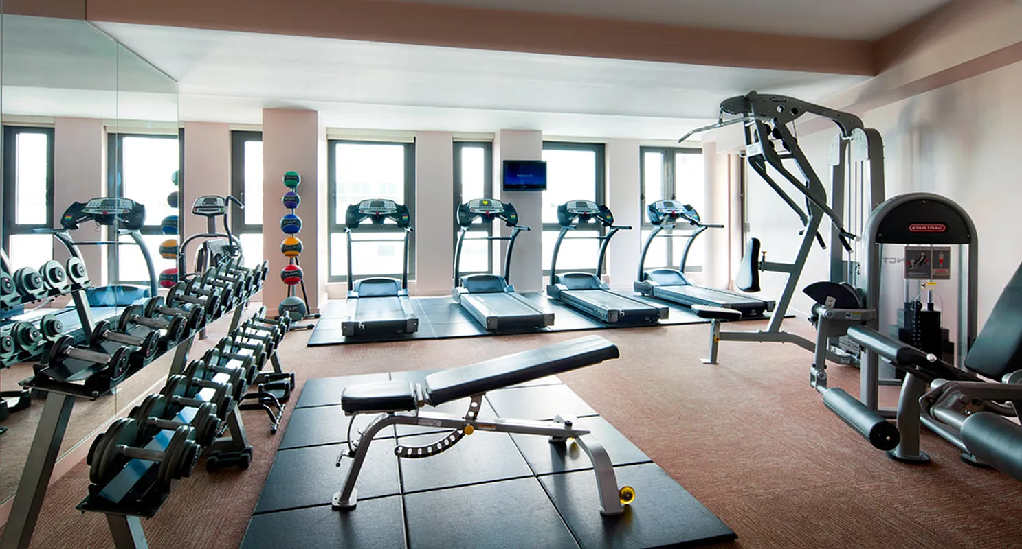 101 Warren Street, Unit 840 Manhattan, NY 10007 - Photo 8 of 16 a view of a room with gym equipment