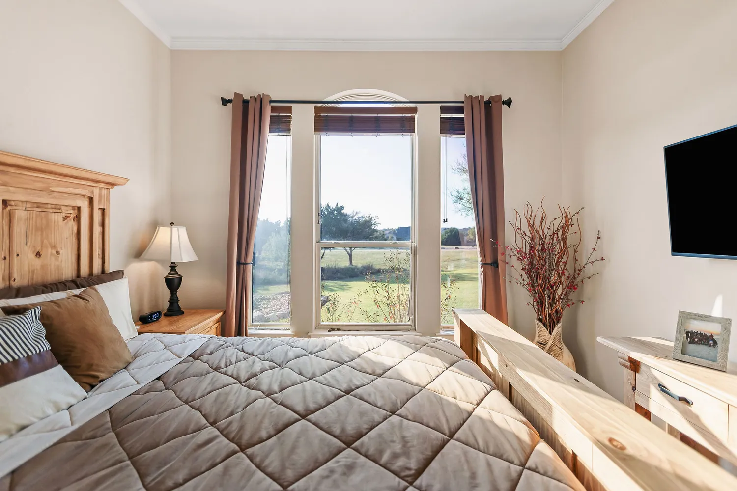 an aerial view of a house with a ocean view