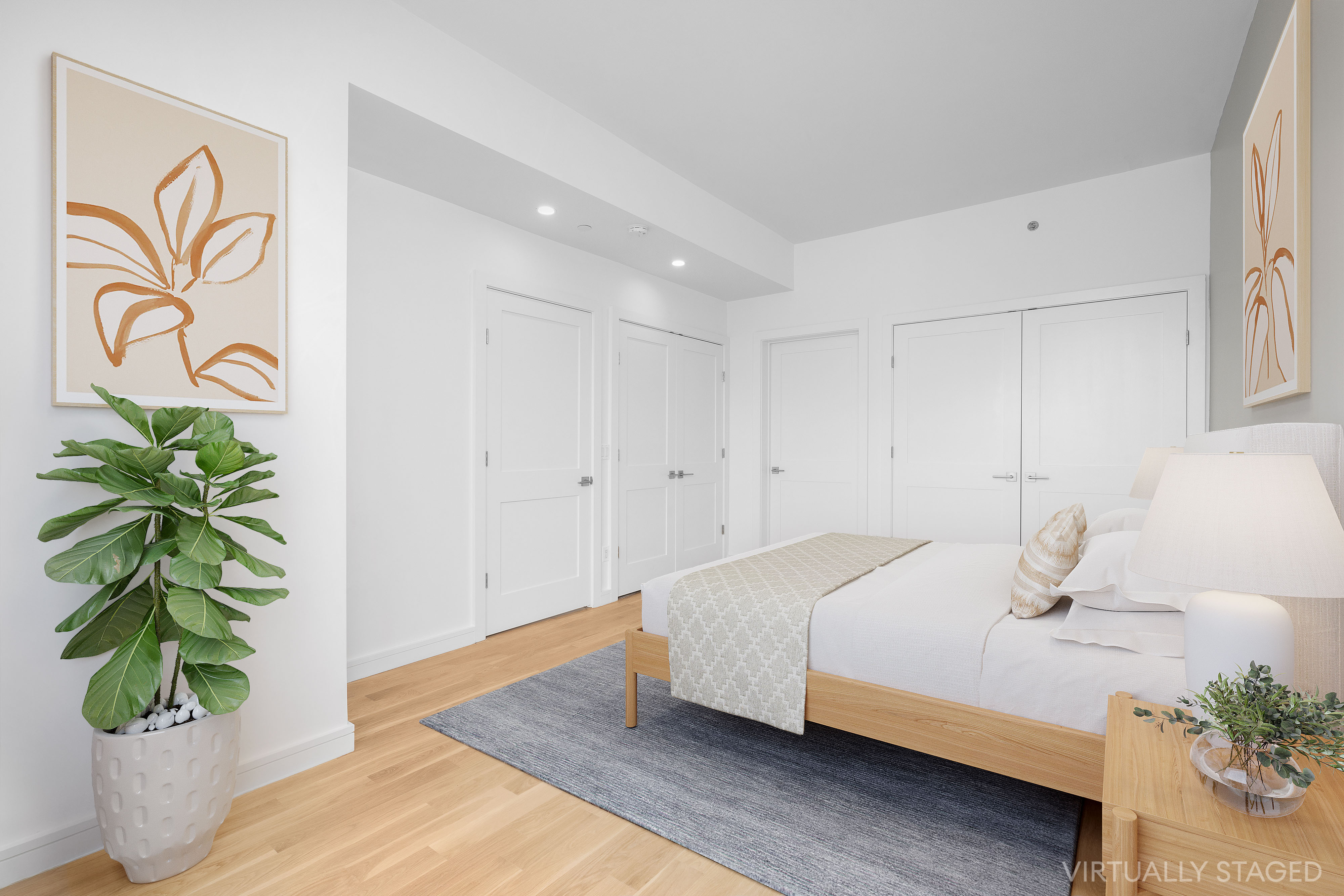 927 Atlantic Avenue, Unit 7A Brooklyn, NY 11238 - Photo 7 of 16 a bedroom with a bed and a potted plant