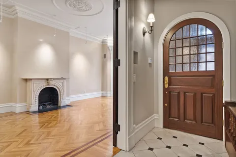 a view of an entryway with a fireplace
