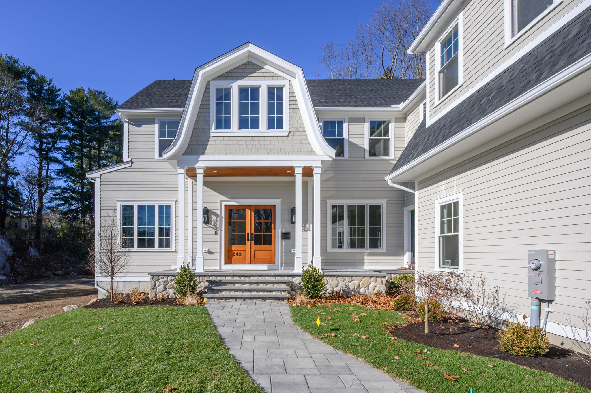 249 Central Avenue Milton, MA 02186 - Photo 4 of 61 a front view of a house with a yard