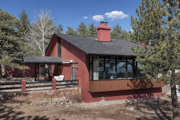 a top view of a house with a yard