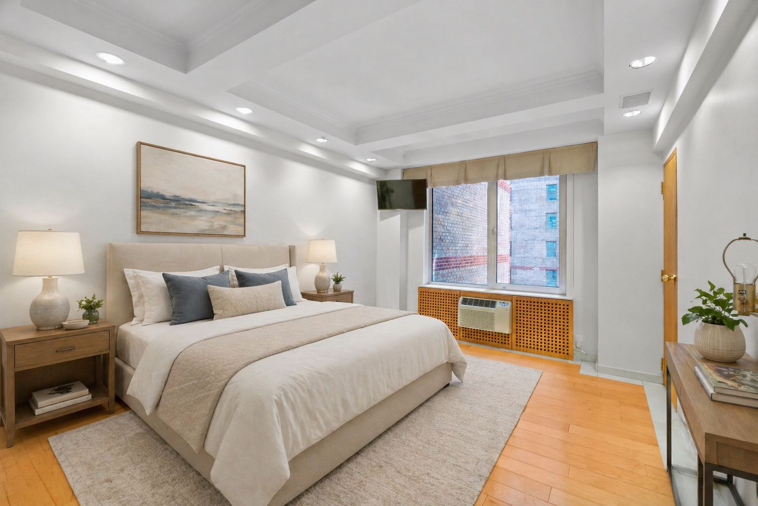 120 Central Park South, Unit 6AB Manhattan, NY 10019 - Photo 13 of 17 a spacious bedroom with a large bed couch and a window