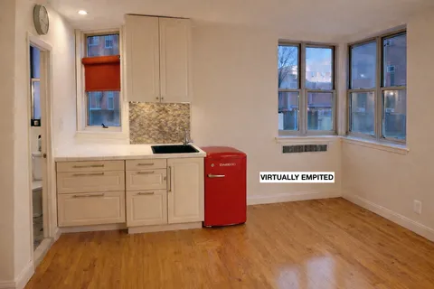 a kitchen with stainless steel appliances granite countertop a stove and a refrigerator