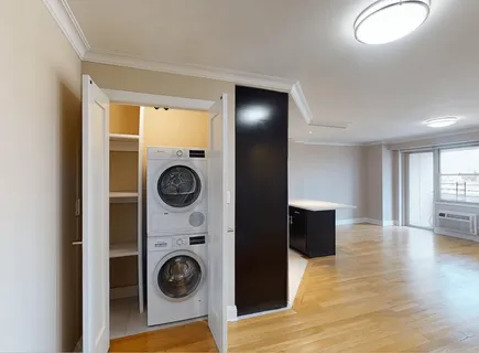 a view of washer and dryer in a utility room