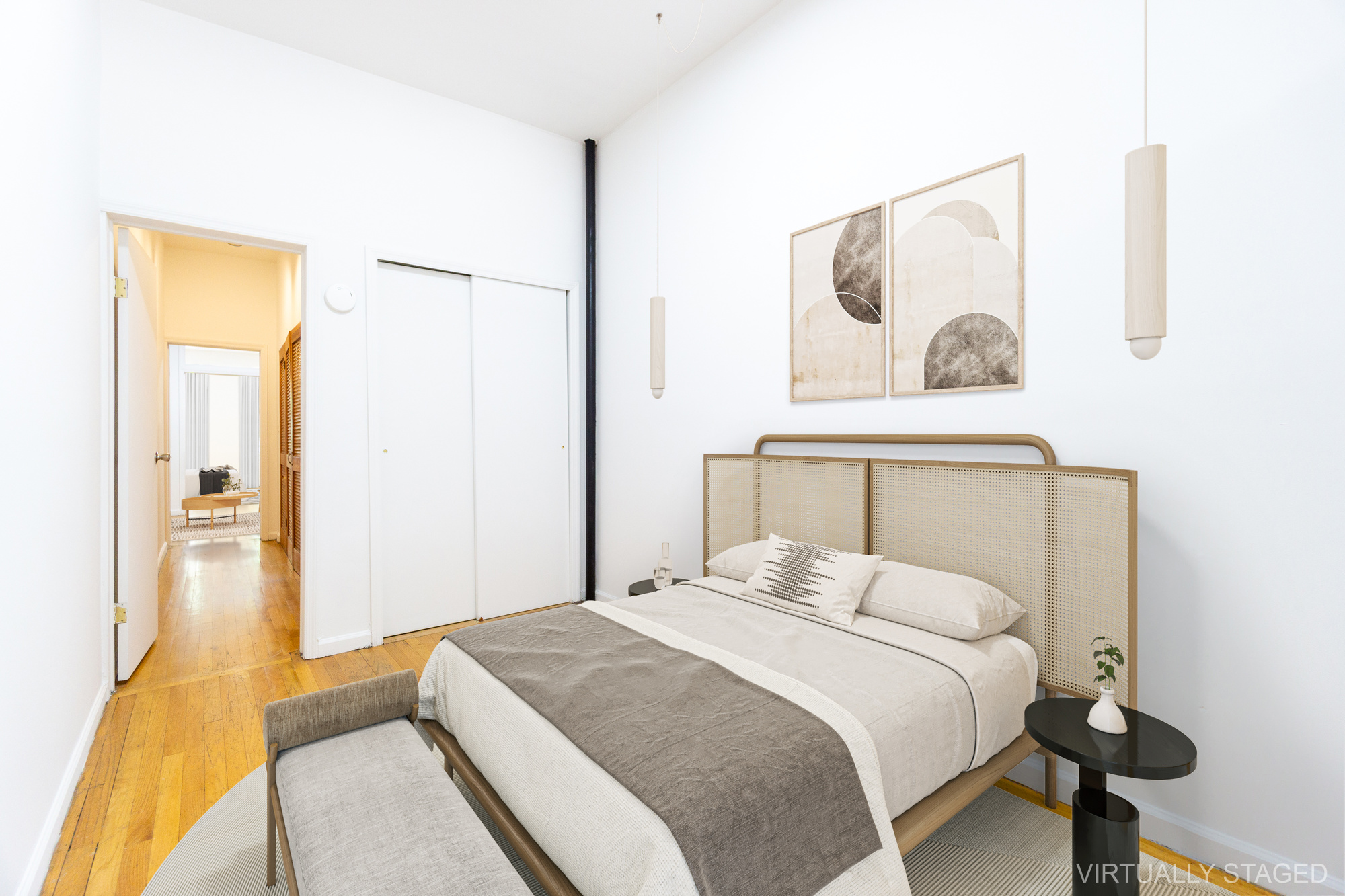 215 East 5th Street, Unit 3 Manhattan, NY 10003 - Photo 9 of 25 a bedroom with a bed and painting on the wall