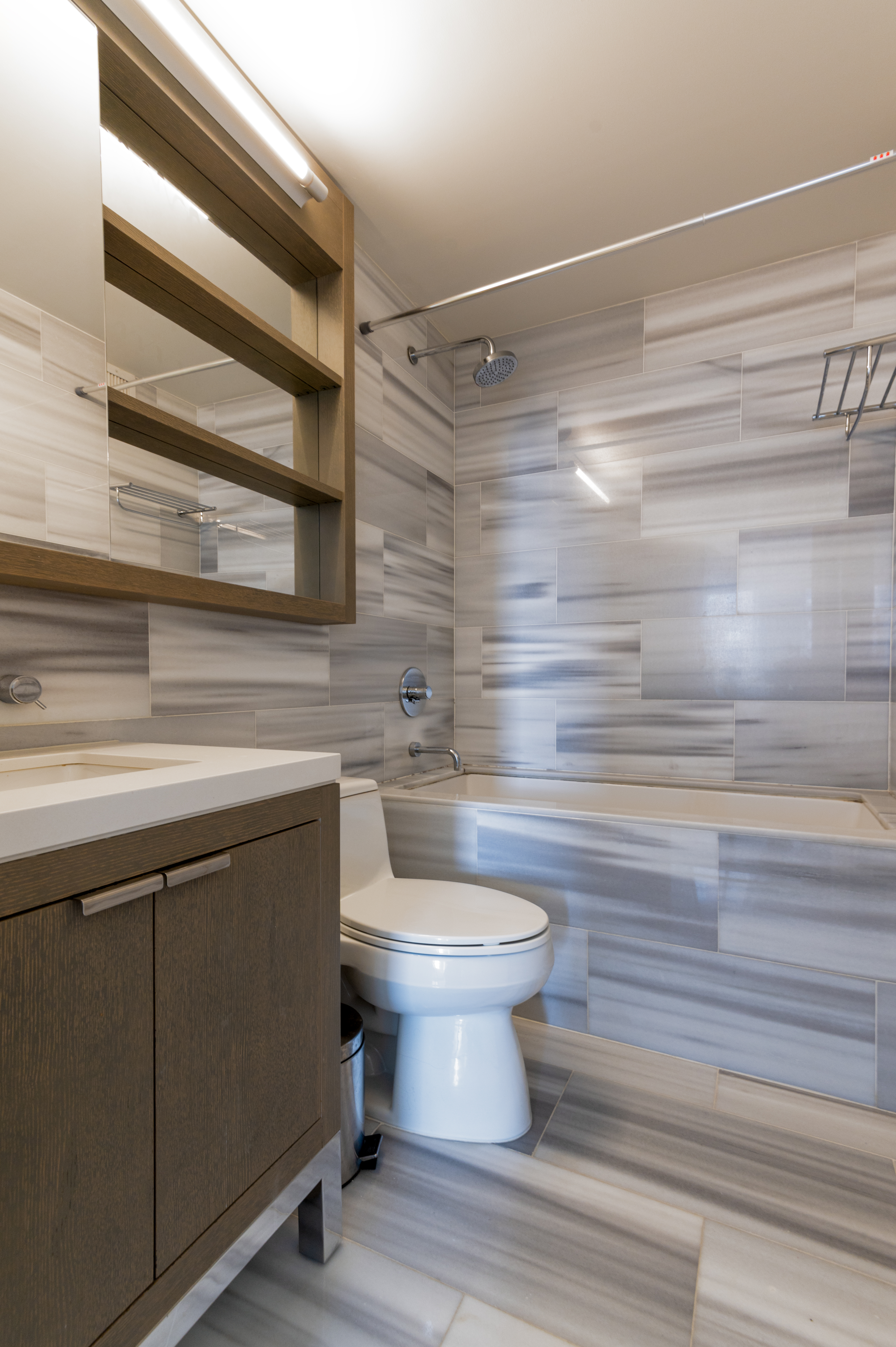 225 Rector Place, Unit 19C Manhattan, NY 10280 - Photo 4 of 11 a bathroom with a sink and a toilet
