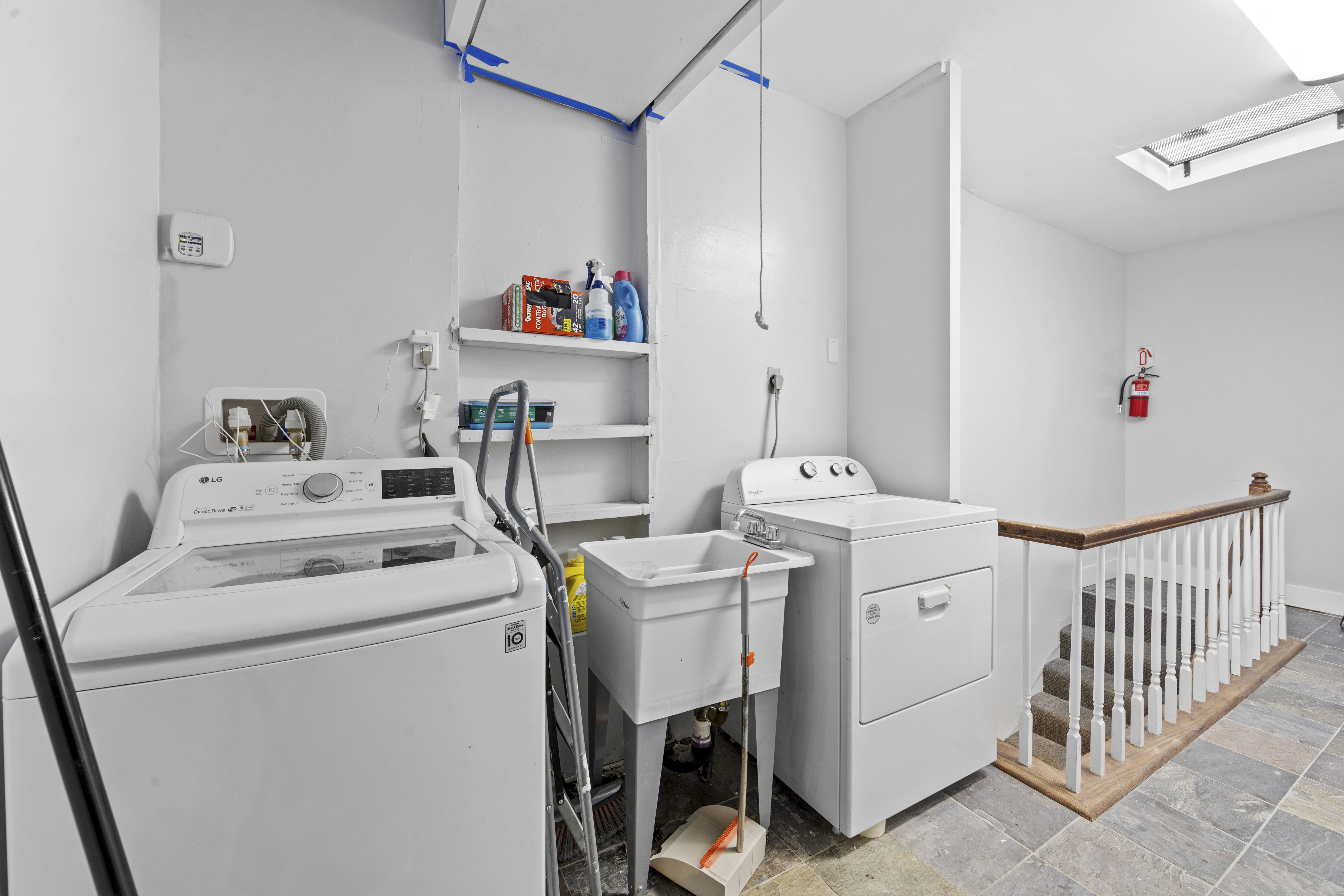 1061 Fulton Street, Unit 3 Brooklyn, NY 11238 - Photo 13 of 14 a utility room with dryer and washer