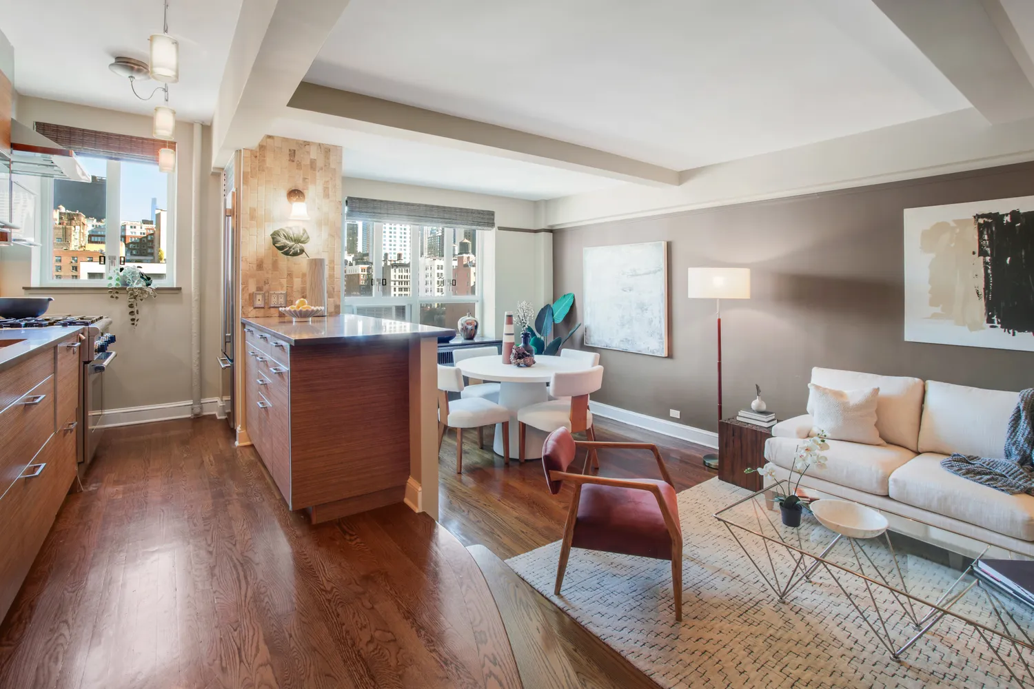 a bathroom with a sink shower and a mirror