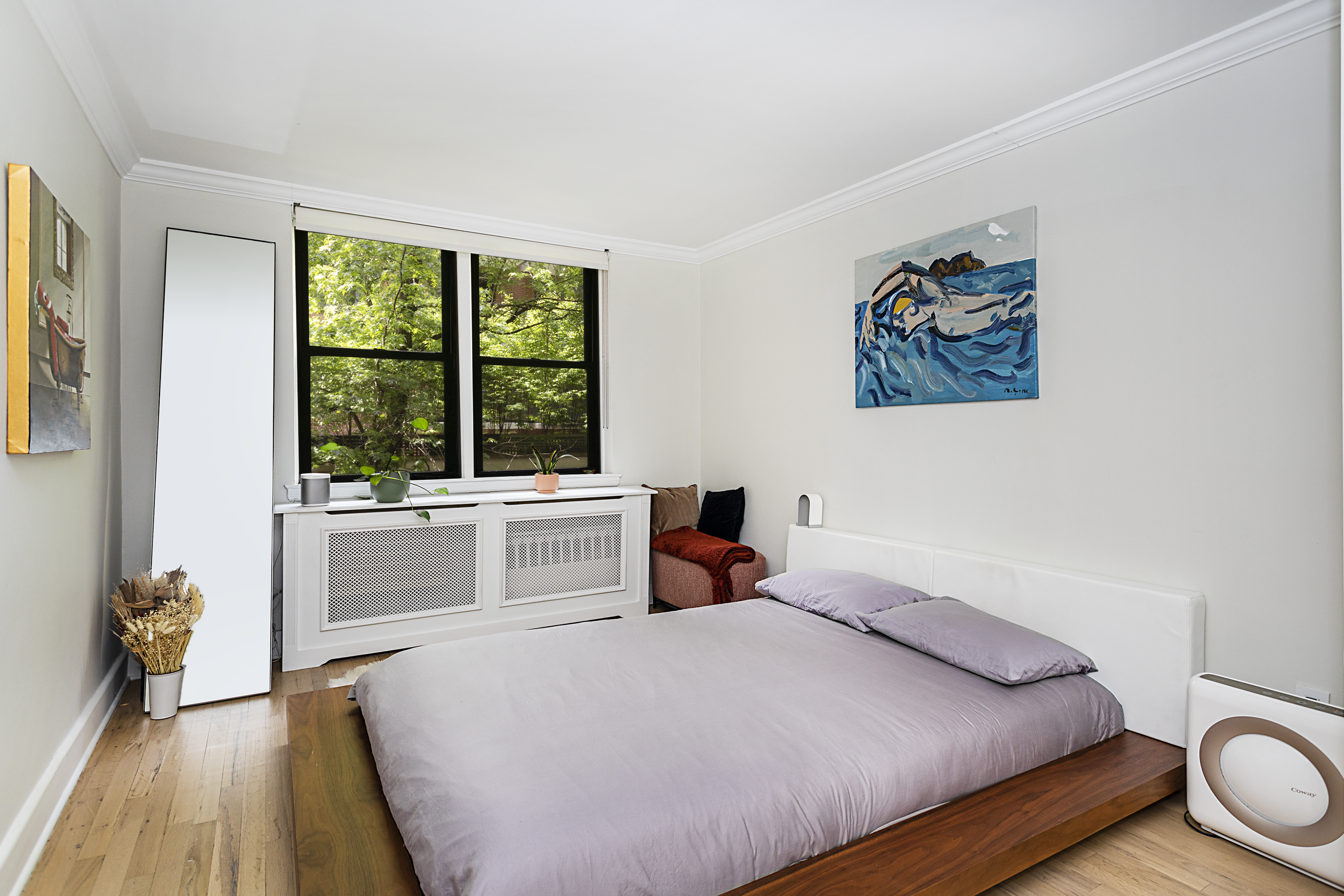 250 West 15th Street, Unit 3C Manhattan, NY 10011 - Photo 6 of 9 a bedroom with a bed and a large window