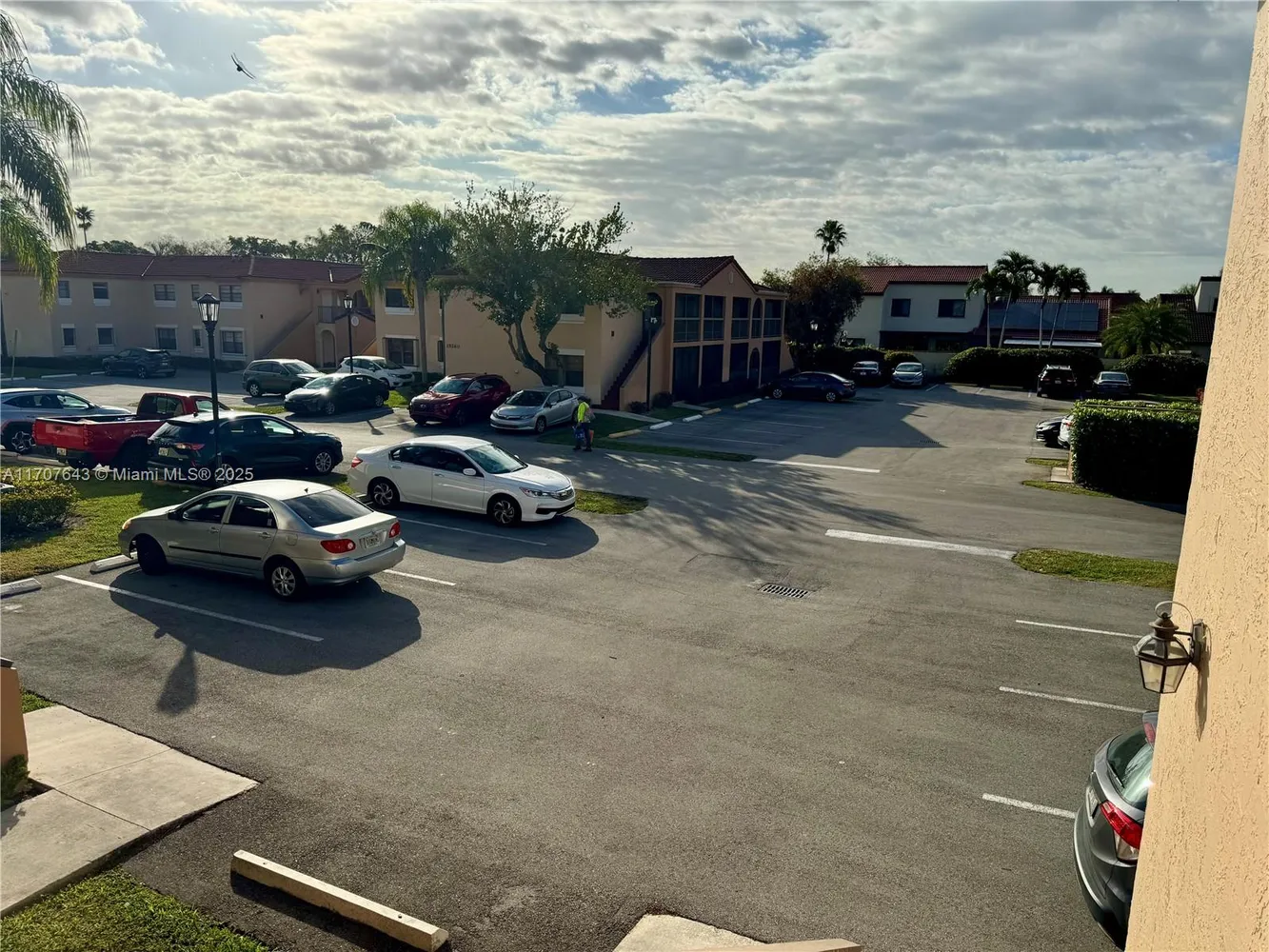a view of a street with cars