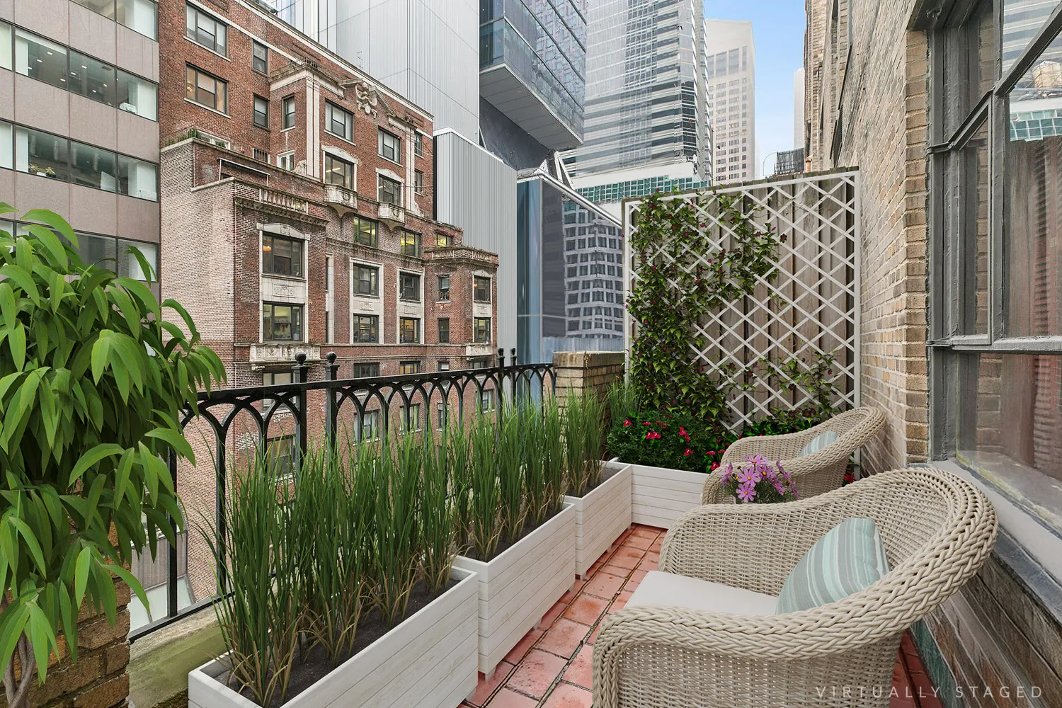 a balcony with table and chairs