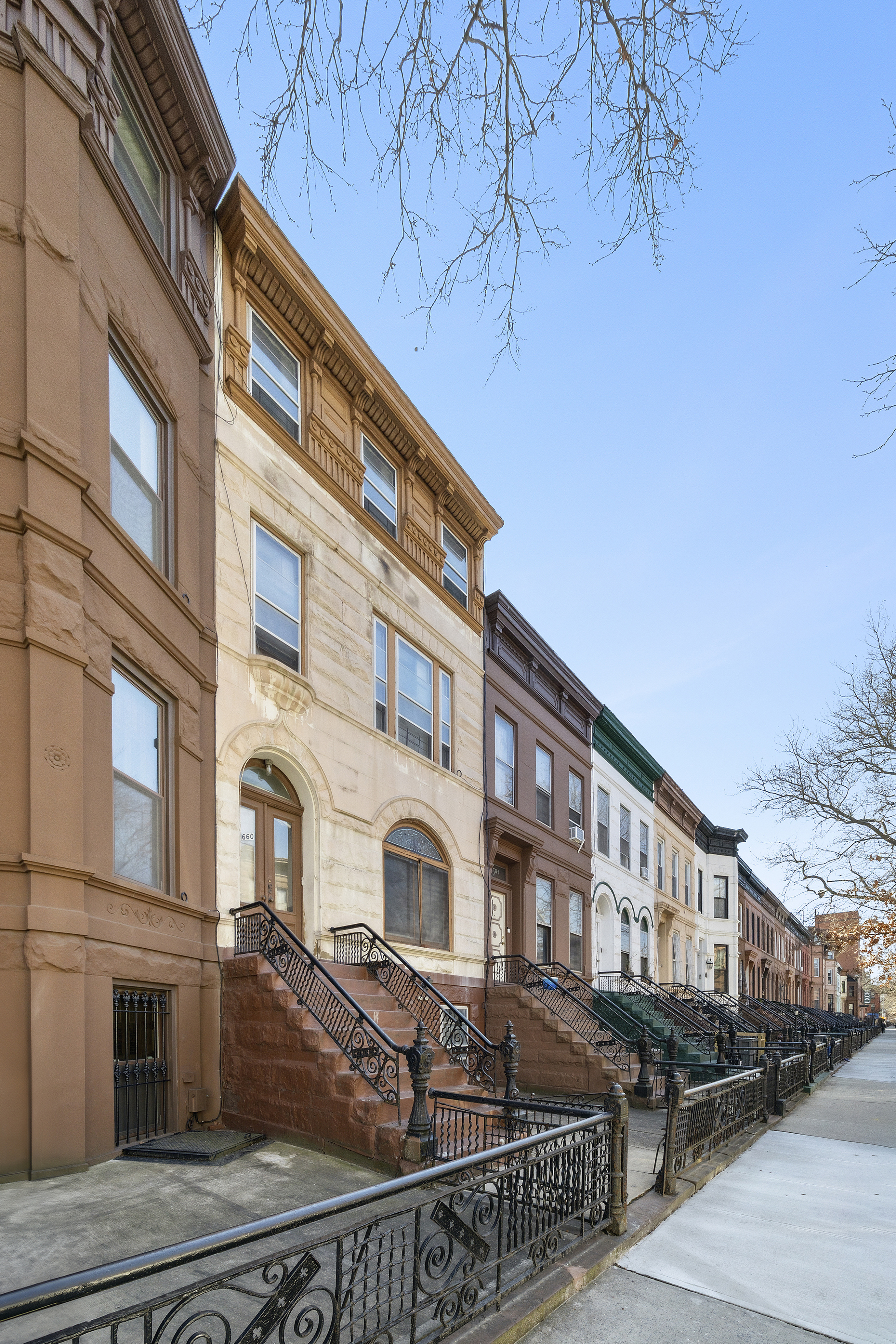 660 Macon Street Brooklyn, NY 11233 - Photo 14 of 17 a front view of a building with glass windows