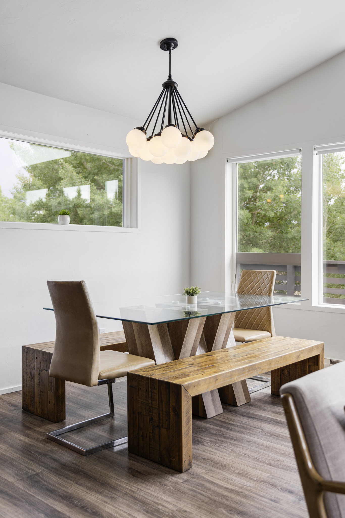 133 Gold Run Road Alma, CO 80420 - Photo 7 of 46 a view of a dining room with furniture wooden floor and chandelier