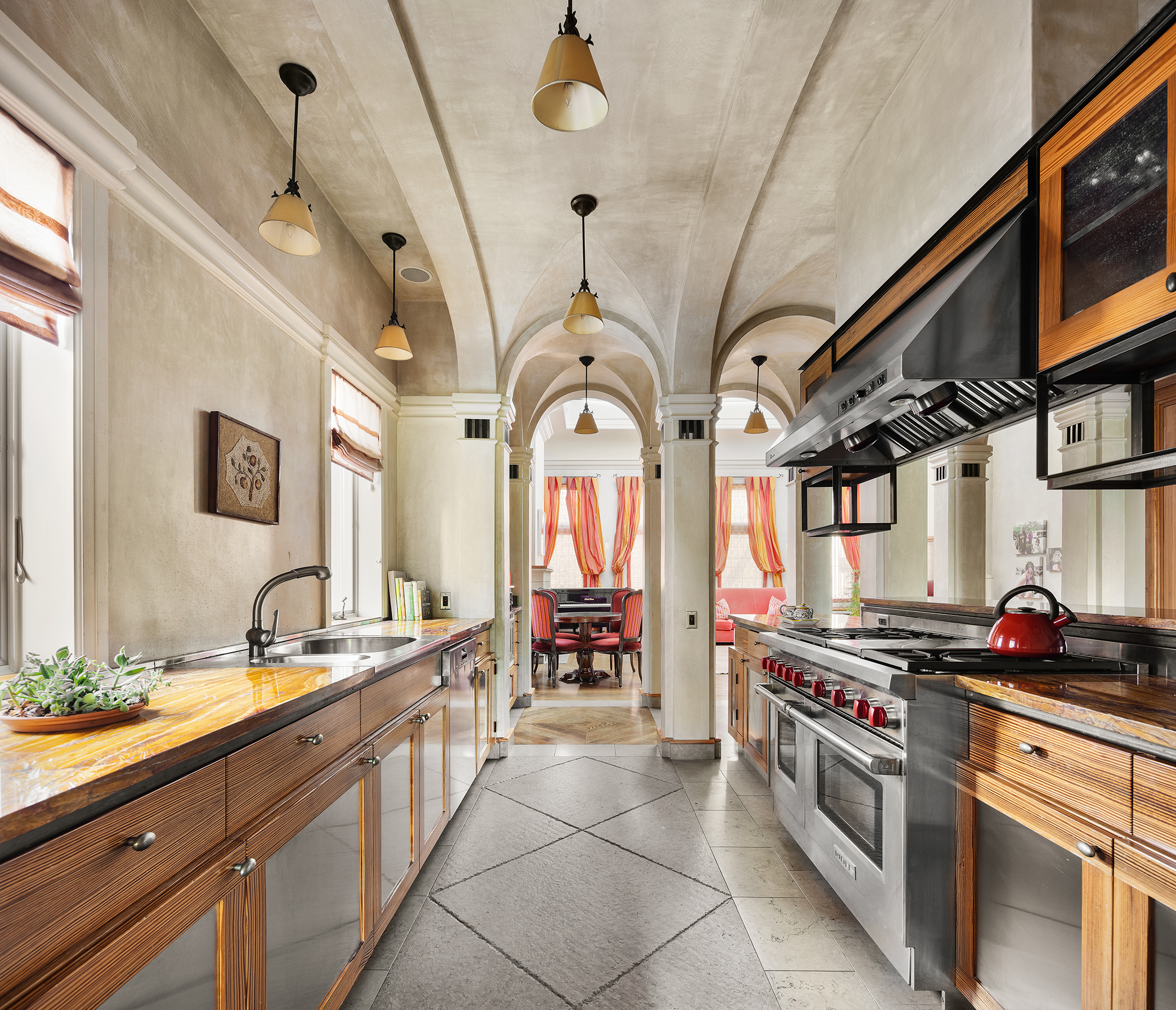428 Columbus Avenue, Unit PH Manhattan, NY 10024 - Photo 20 of 23 a kitchen with stainless steel appliances a stove a sink and cabinets