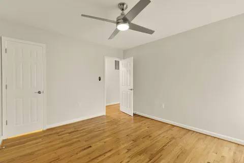 a bathroom with a sink a mirror and vanity