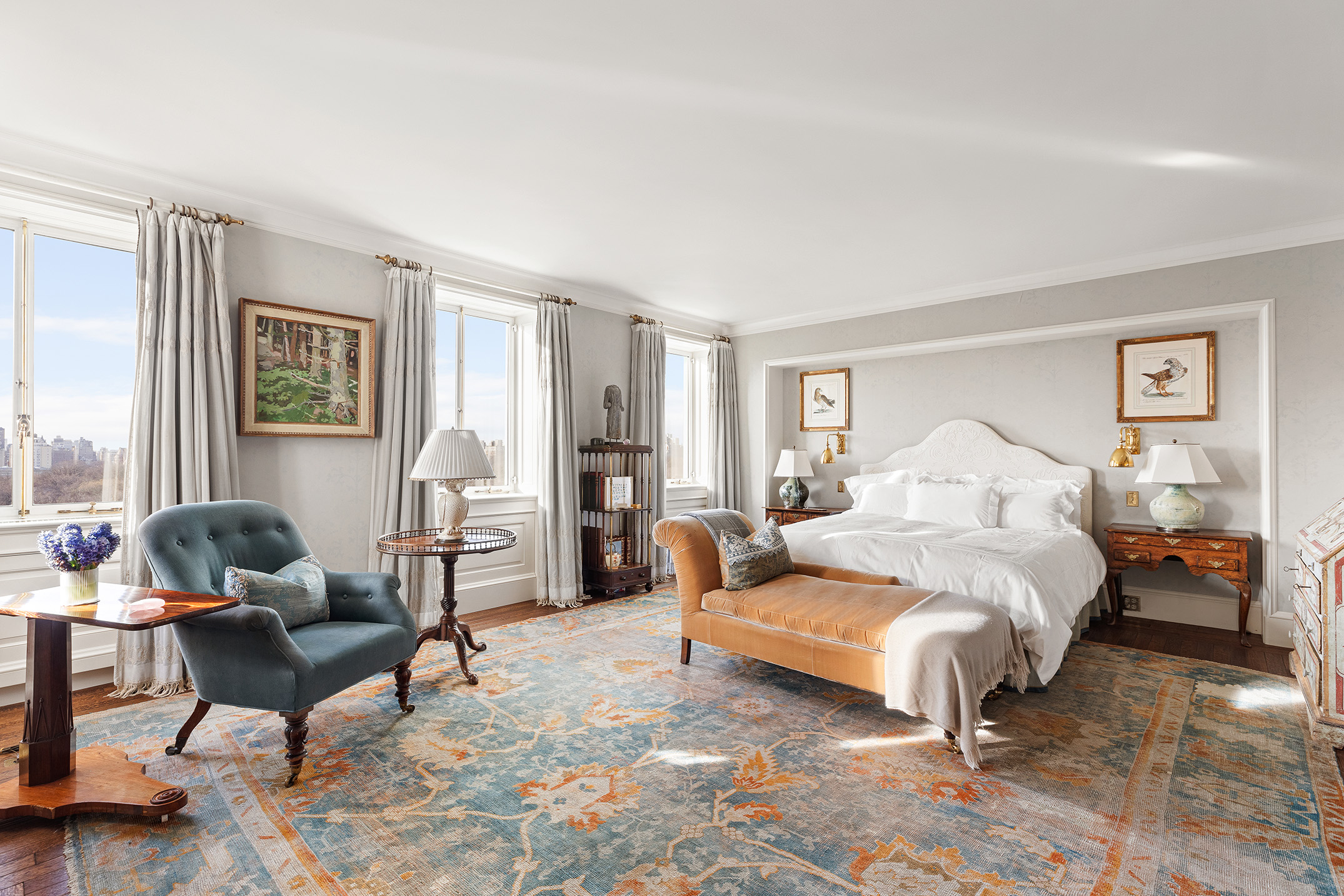 953 5th Avenue, Unit PH Manhattan, NY 10075 - Photo 11 of 27 a bedroom with furniture and a couch