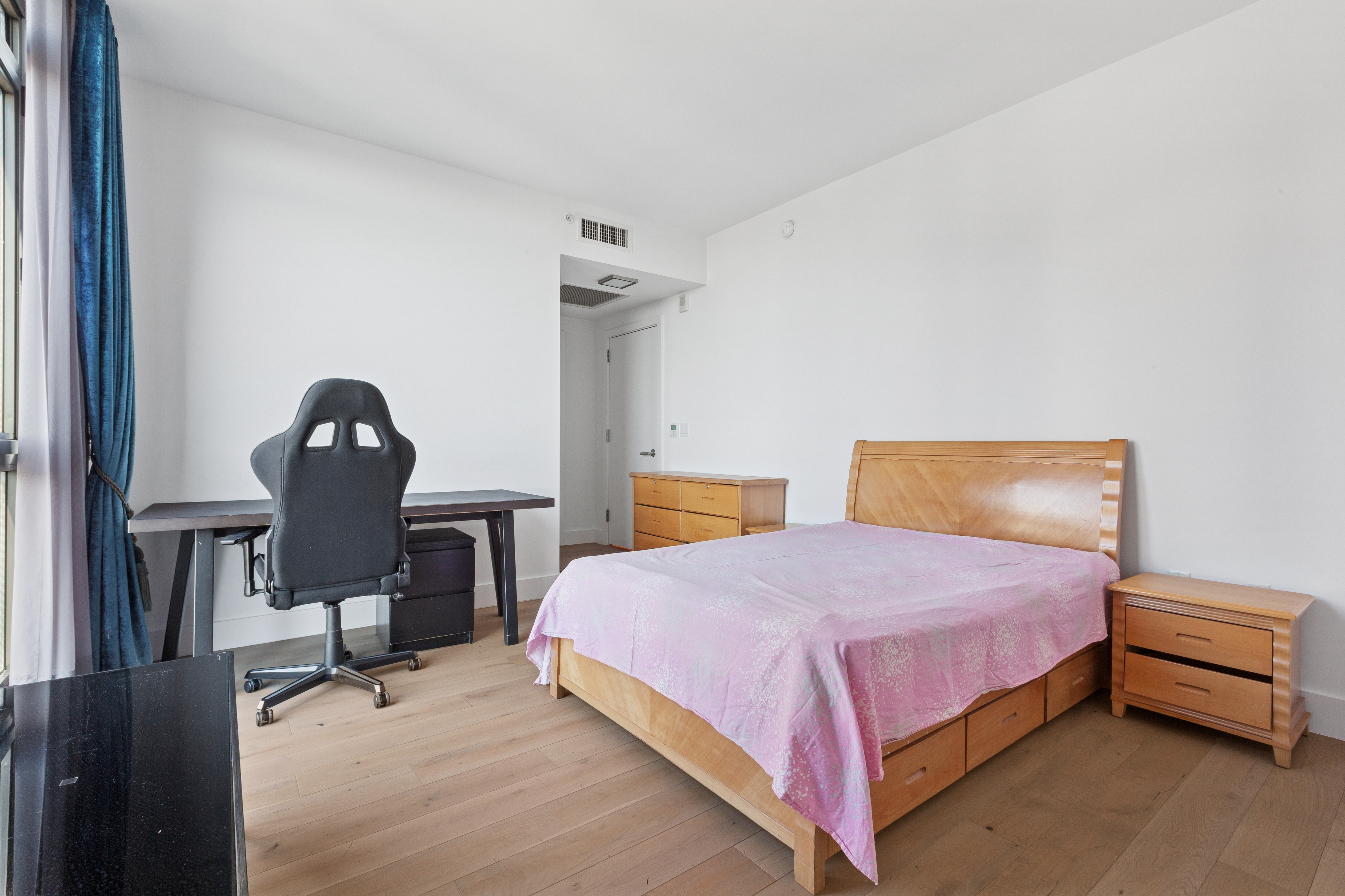 319 Schermerhorn Street, Unit 19B Brooklyn, NY 11217 - Photo 7 of 13 a bedroom with a bed and a chair