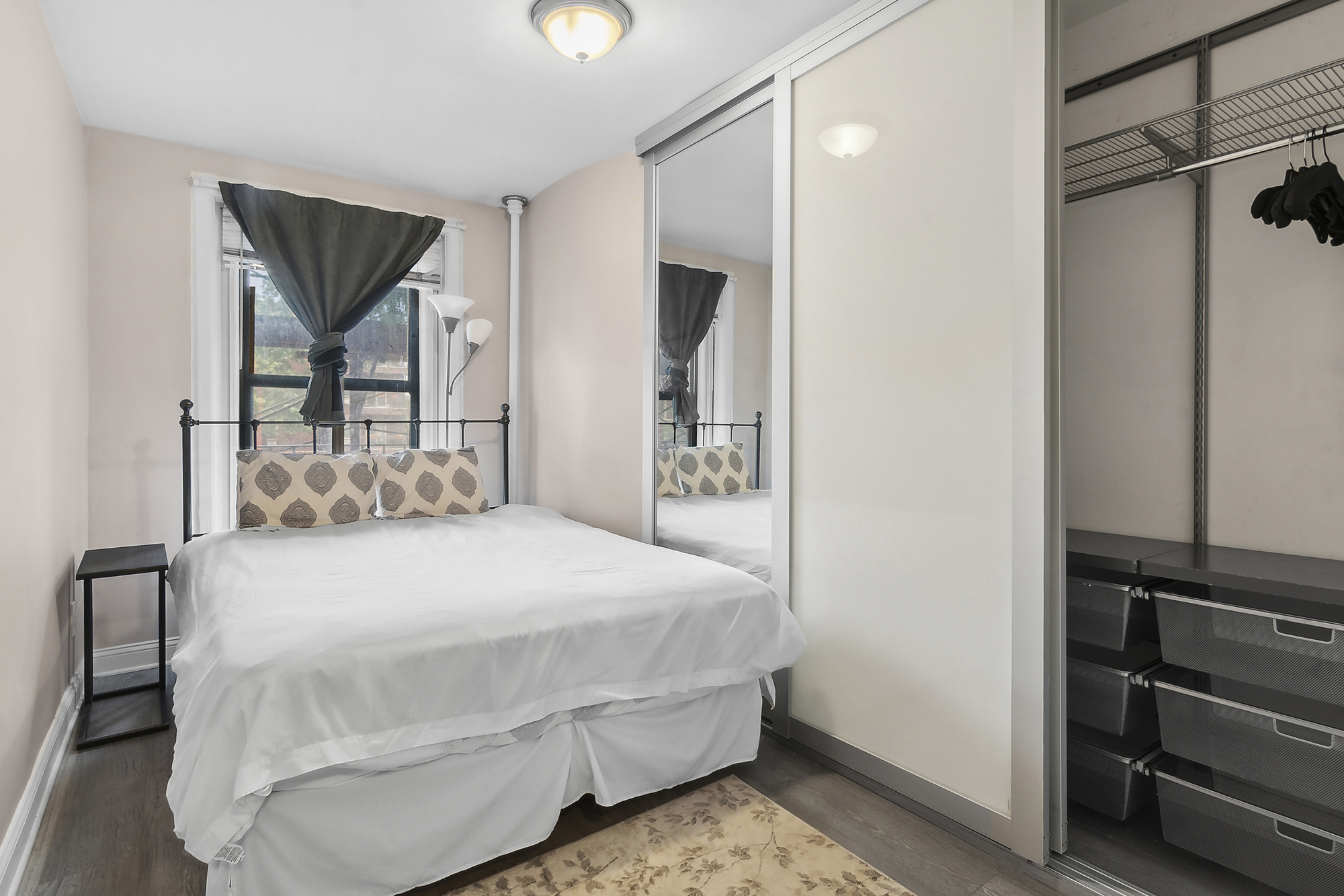 439 Hicks Street, Unit 2C Brooklyn, NY 11201 - Photo 4 of 7 a bedroom with a bed and a window