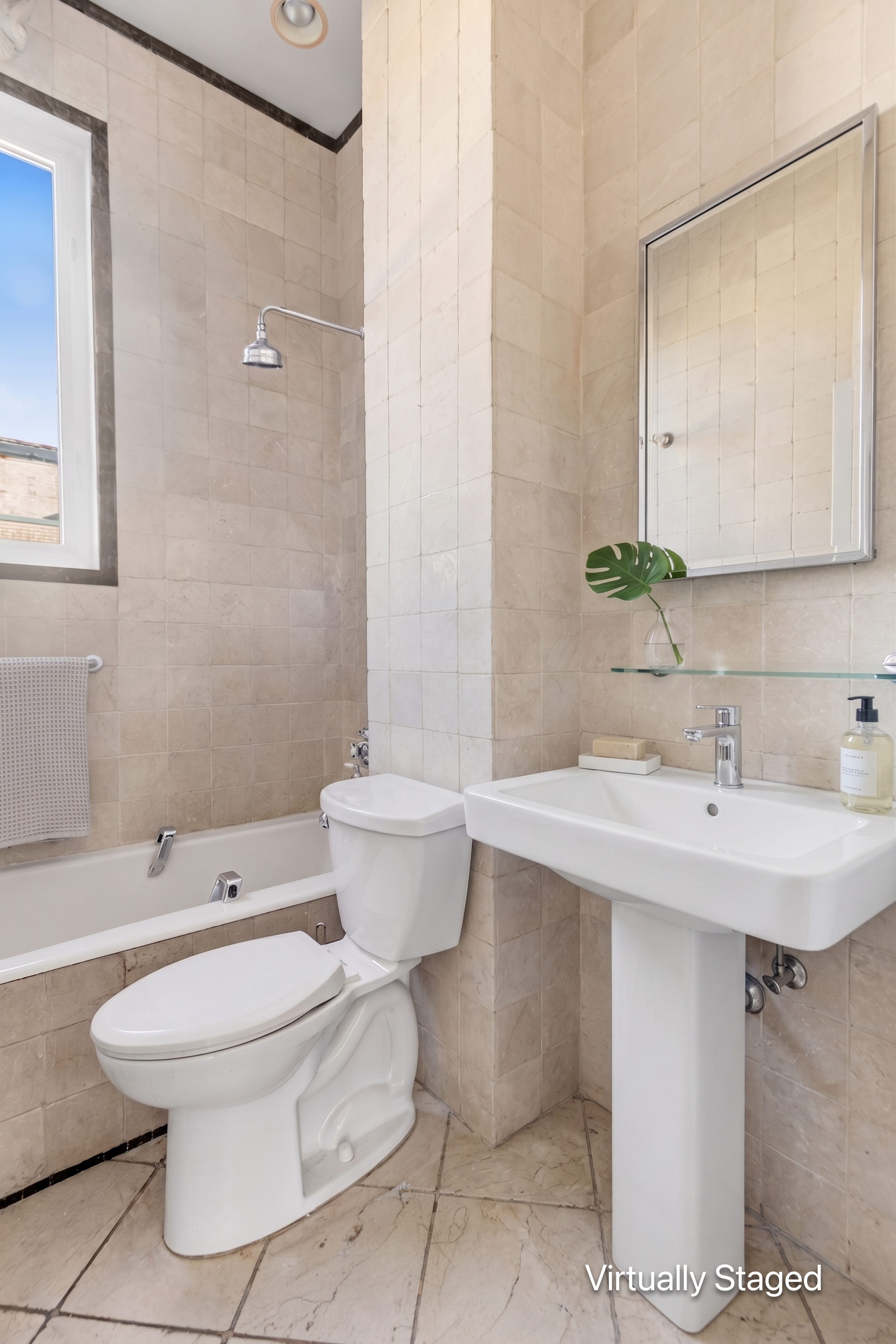 470 West End Avenue, Unit PH-G New York, NY 10024 - Photo 18 of 22 a bathroom with a sink toilet a mirror and shower