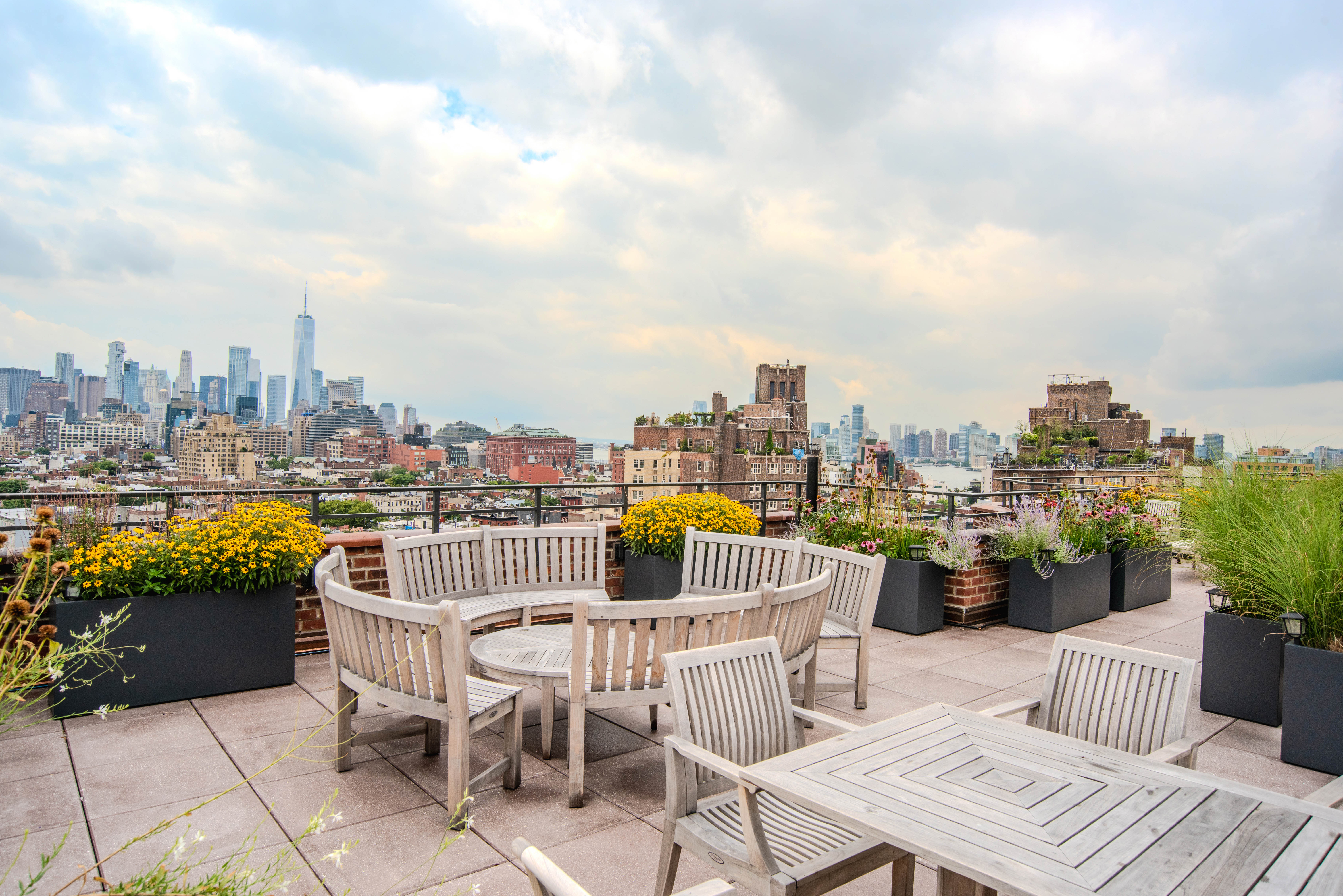 31 Jane Street, Unit 9AB Manhattan, NY 10014 - Photo 12 of 14 a view of a roof deck with furniture