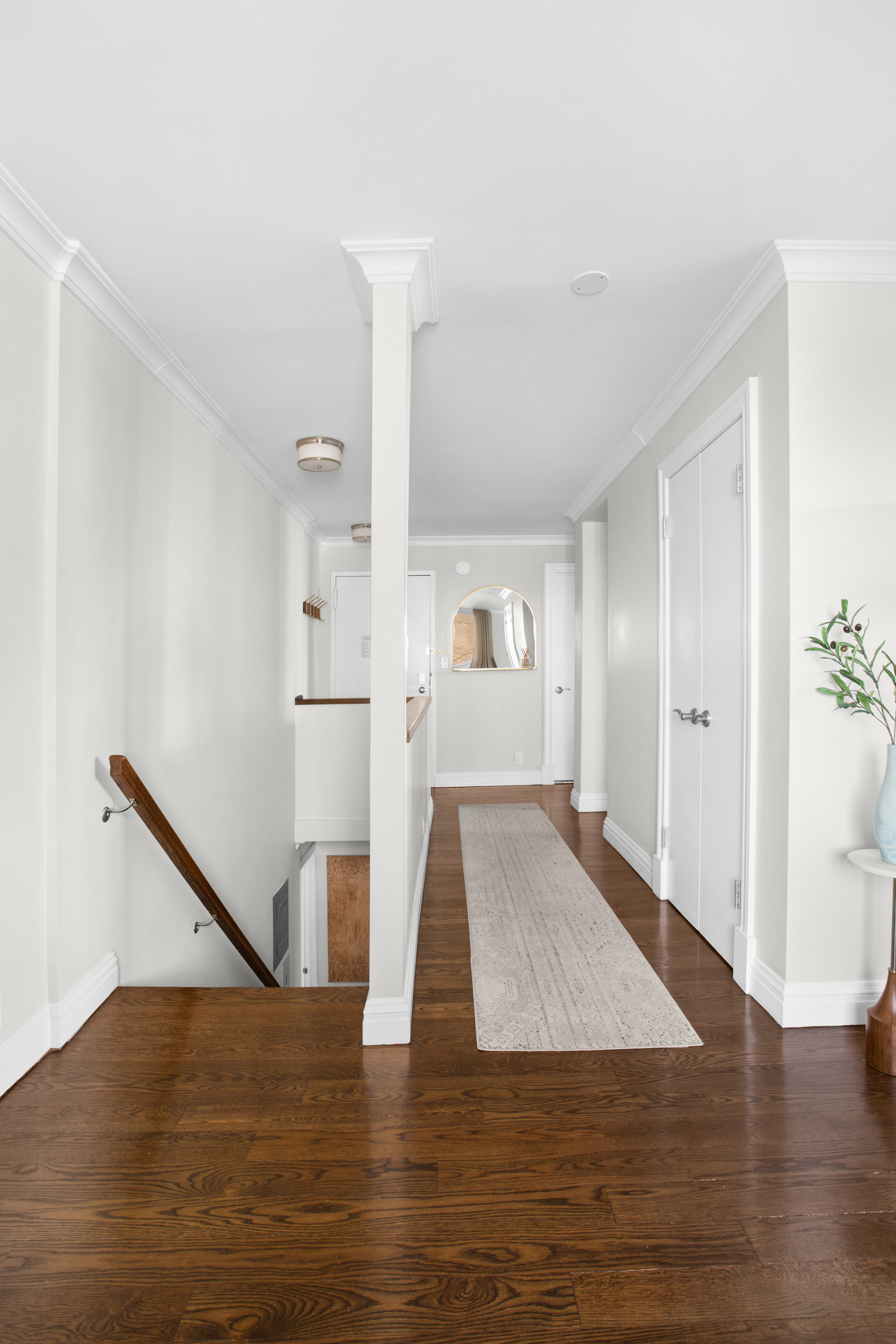 575 Main Street, Unit 509 Manhattan, NY 10044 - Photo 6 of 25 a view of entryway and hall with wooden floor