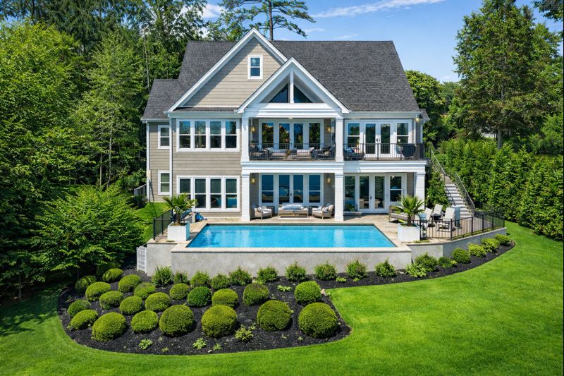 249 Pointe Overlook Drive Chapin, SC 29036 - Photo 2 of 56 a front view of house with yard and outdoor seating