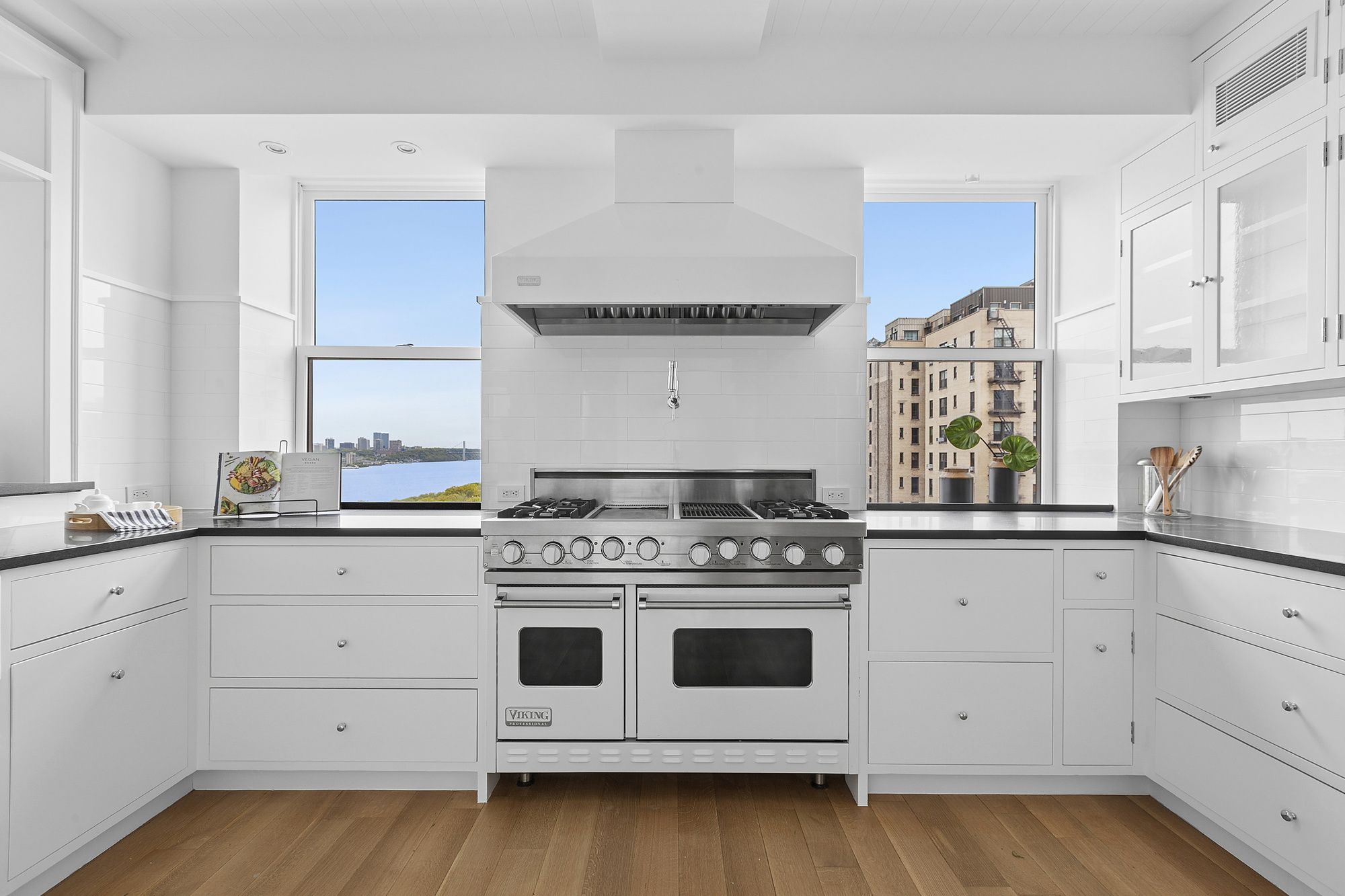 325 Riverside Drive, Unit 111 Manhattan, NY 10025 - Photo 6 of 13 a white stove top oven sitting inside of a kitchen