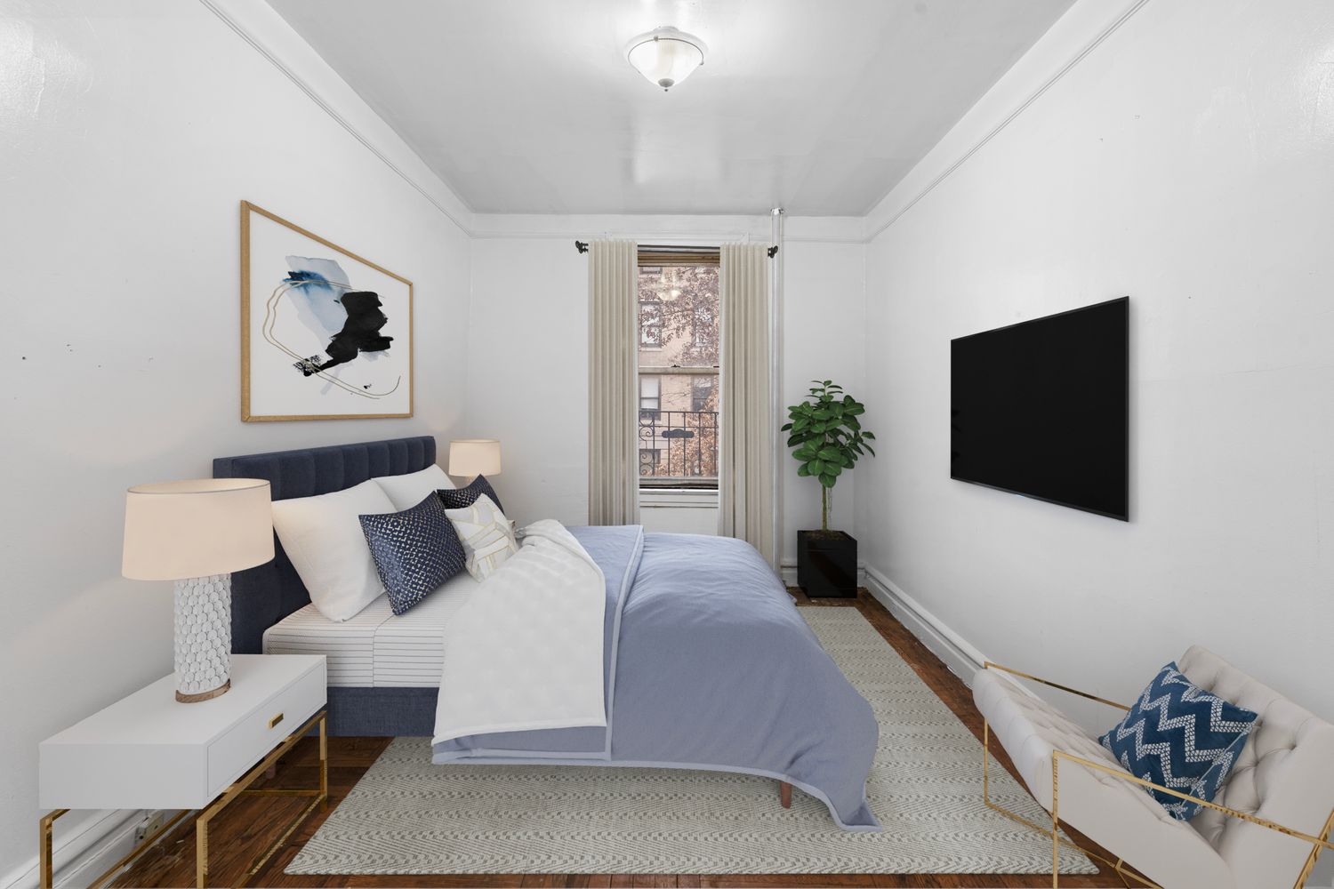 a bedroom with a large bed and a flat screen tv
