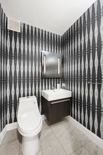 a bathroom with a sink and toilet