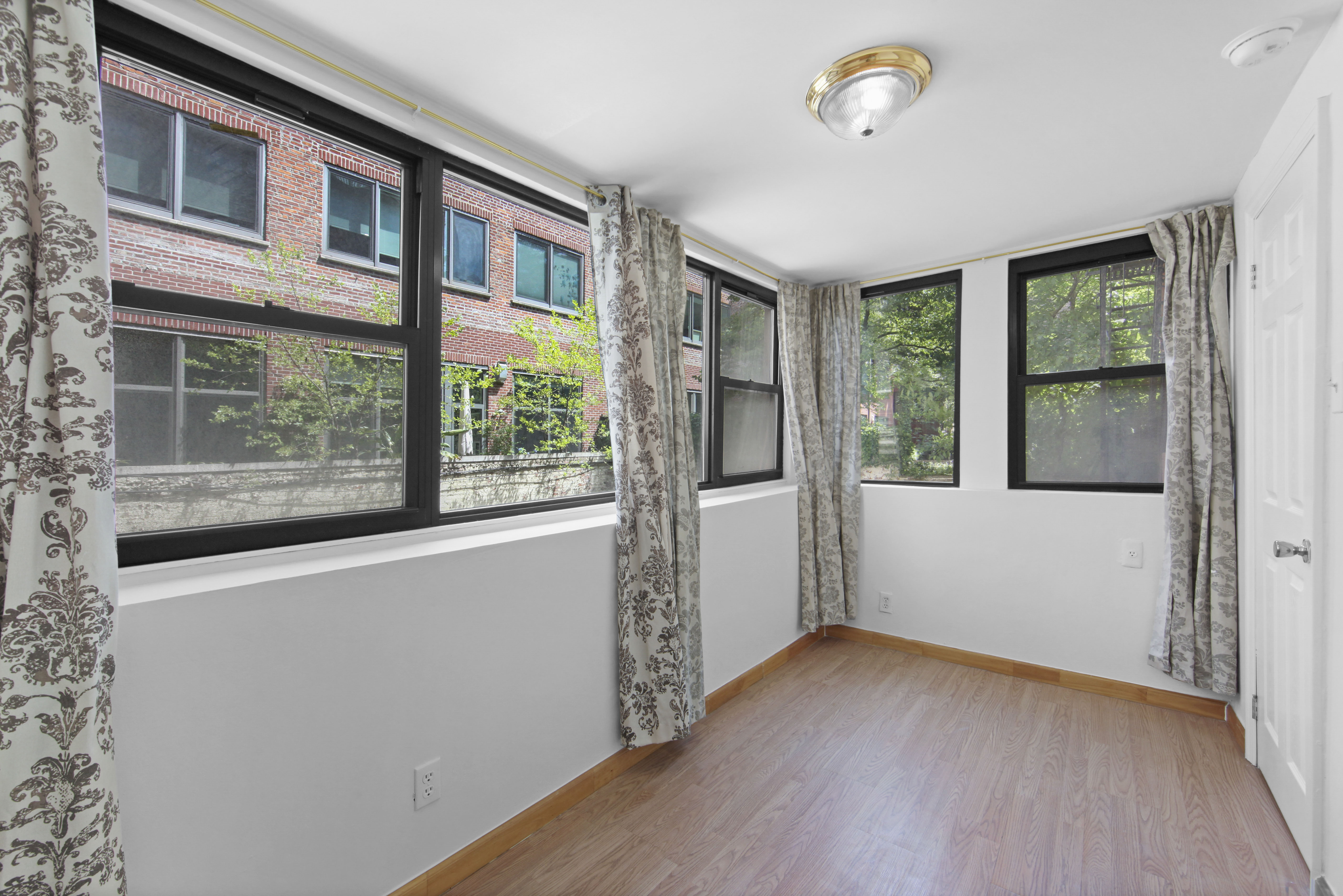 155 Hicks Street, Unit 2B Brooklyn, NY 11201 - Photo 4 of 11 a view of a room with a large window