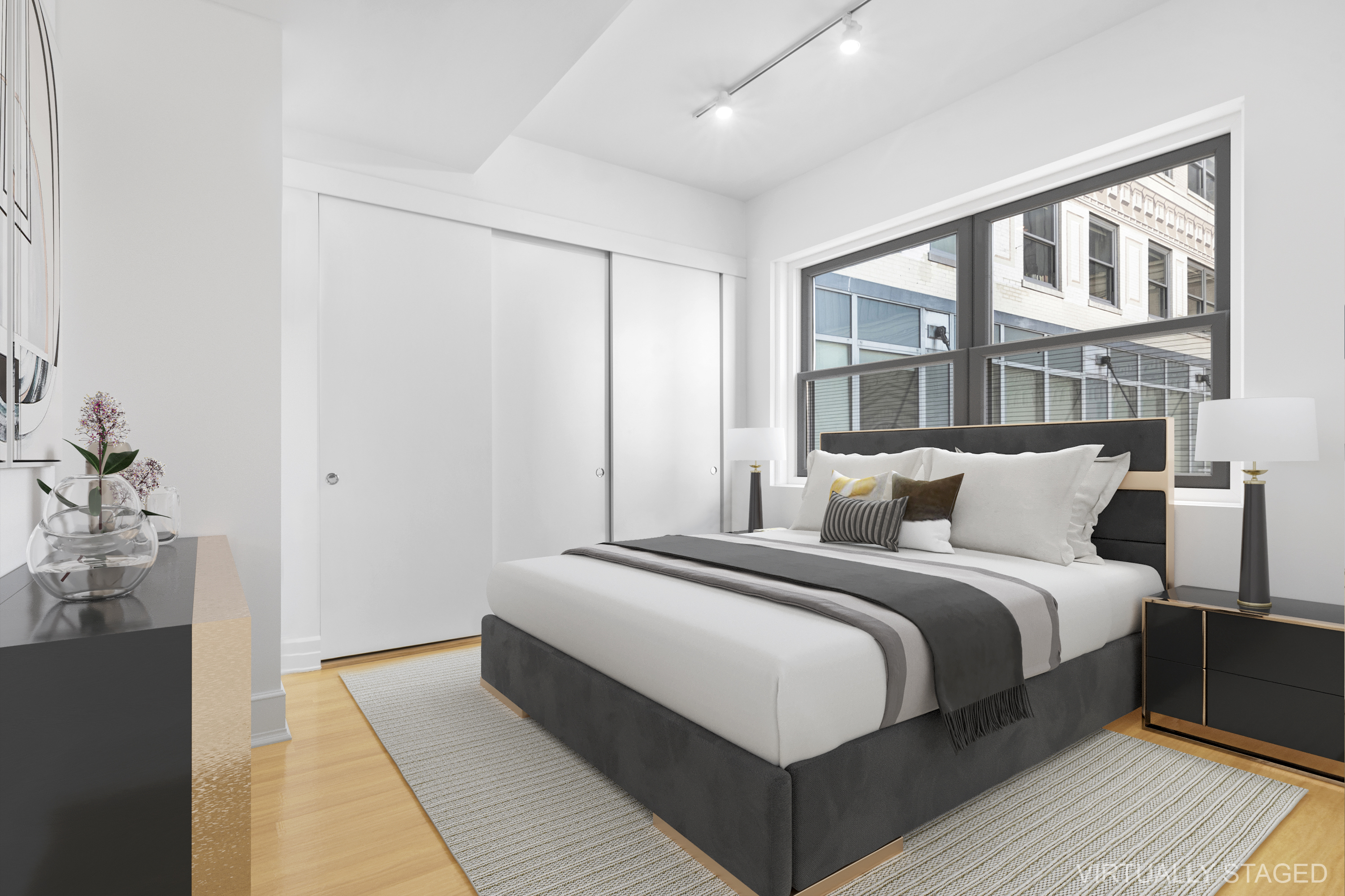 110 Livingston Street, Unit 8A Brooklyn, NY 11201 - Photo 4 of 12 a bedroom with bed and wooden floor