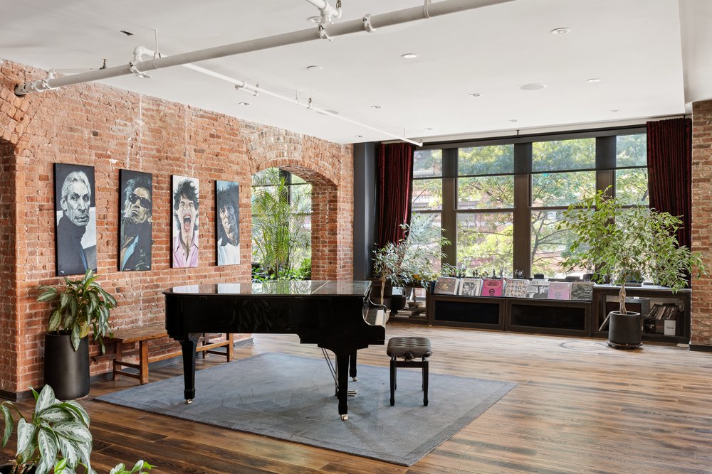 345 West 13th Street, Unit 2DEG Manhattan, NY 10014 - Photo 3 of 14 a living room filled with furniture and a large window