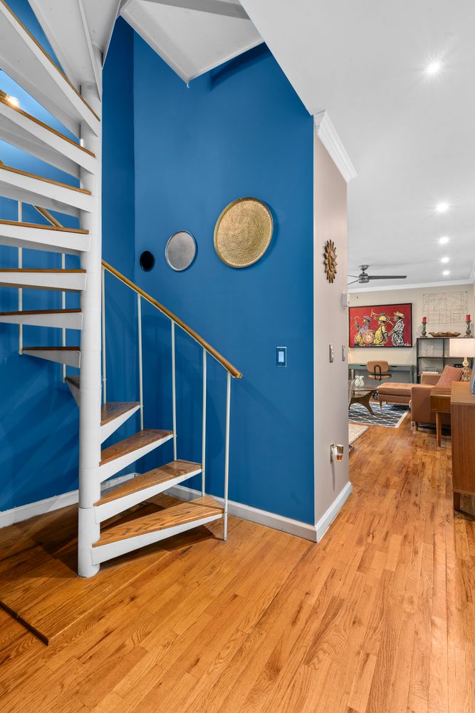 a view of kitchen and wooden floor