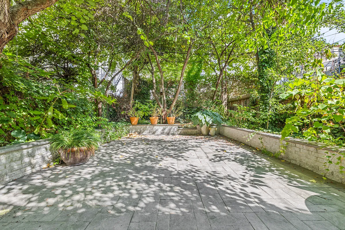 155 Luquer Street, Unit 1 Brooklyn, NY 11231 - Photo 13 of 13 a view of outdoor space with deck and tree