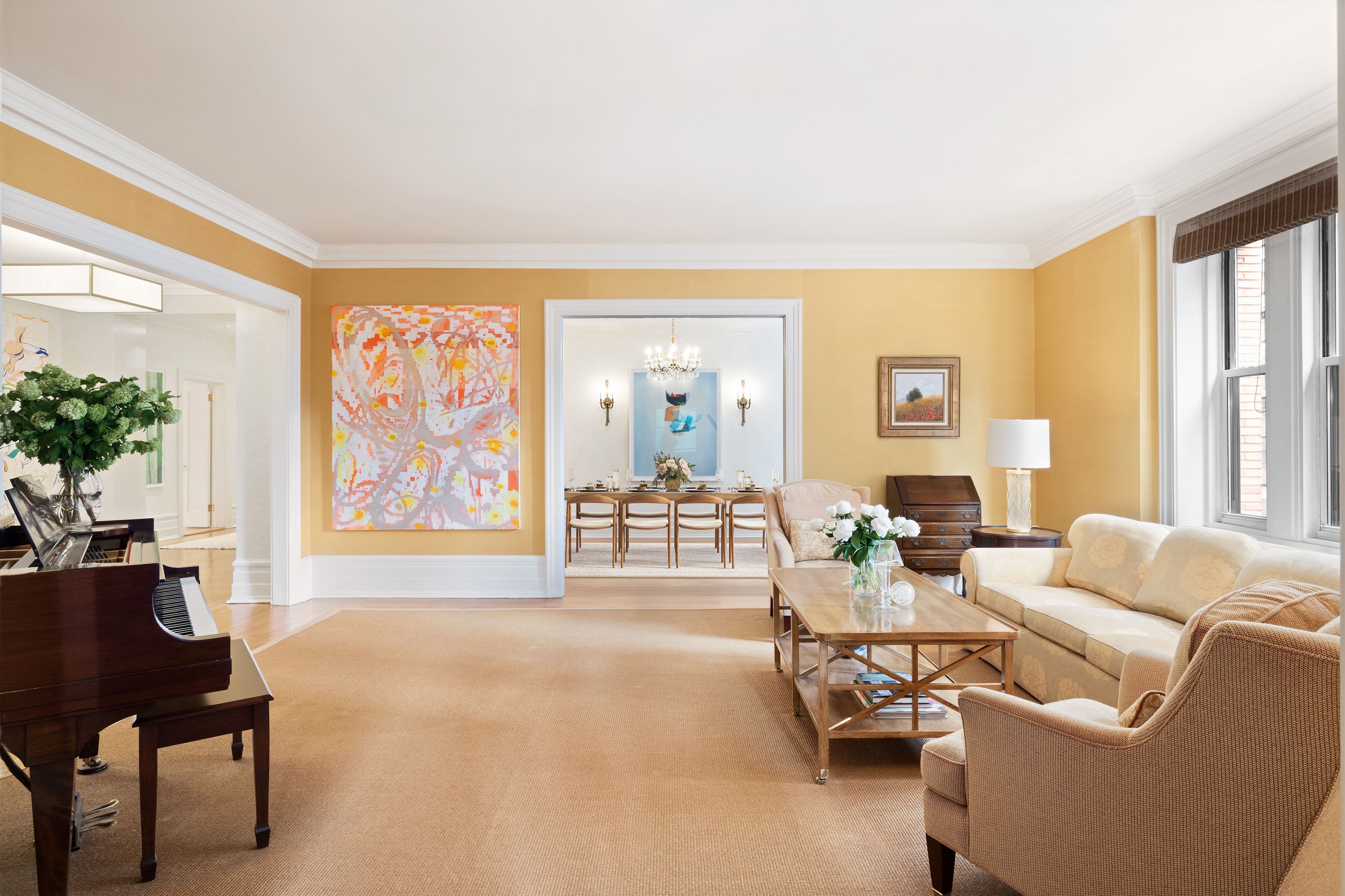 325 West End Avenue, Unit 6AB Manhattan, NY 10023 - Photo 2 of 22 a living room with furniture and a large window