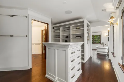 a kitchen with stainless steel appliances granite countertop a stove and a refrigerator