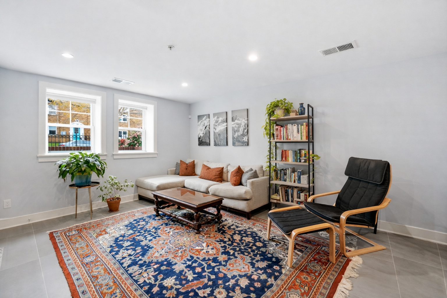 1244 Raum Street Northeast, Unit 5 Washington, DC 20002 - Photo 9 of 21 a living room with furniture and a potted plant