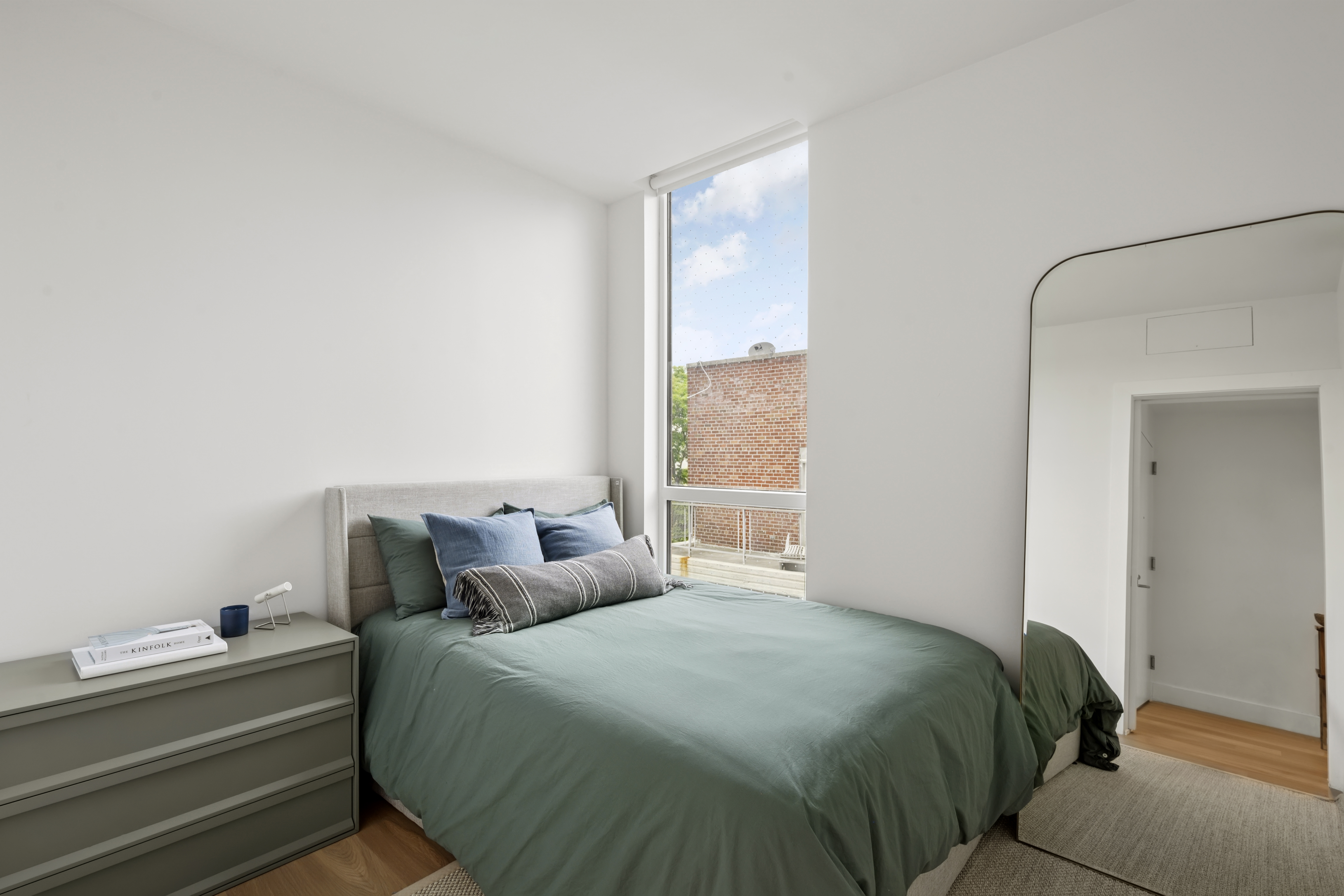 340 Lenox Road, Unit 6D Brooklyn, NY 11226 - Photo 8 of 29 a bedroom with a bed and a window