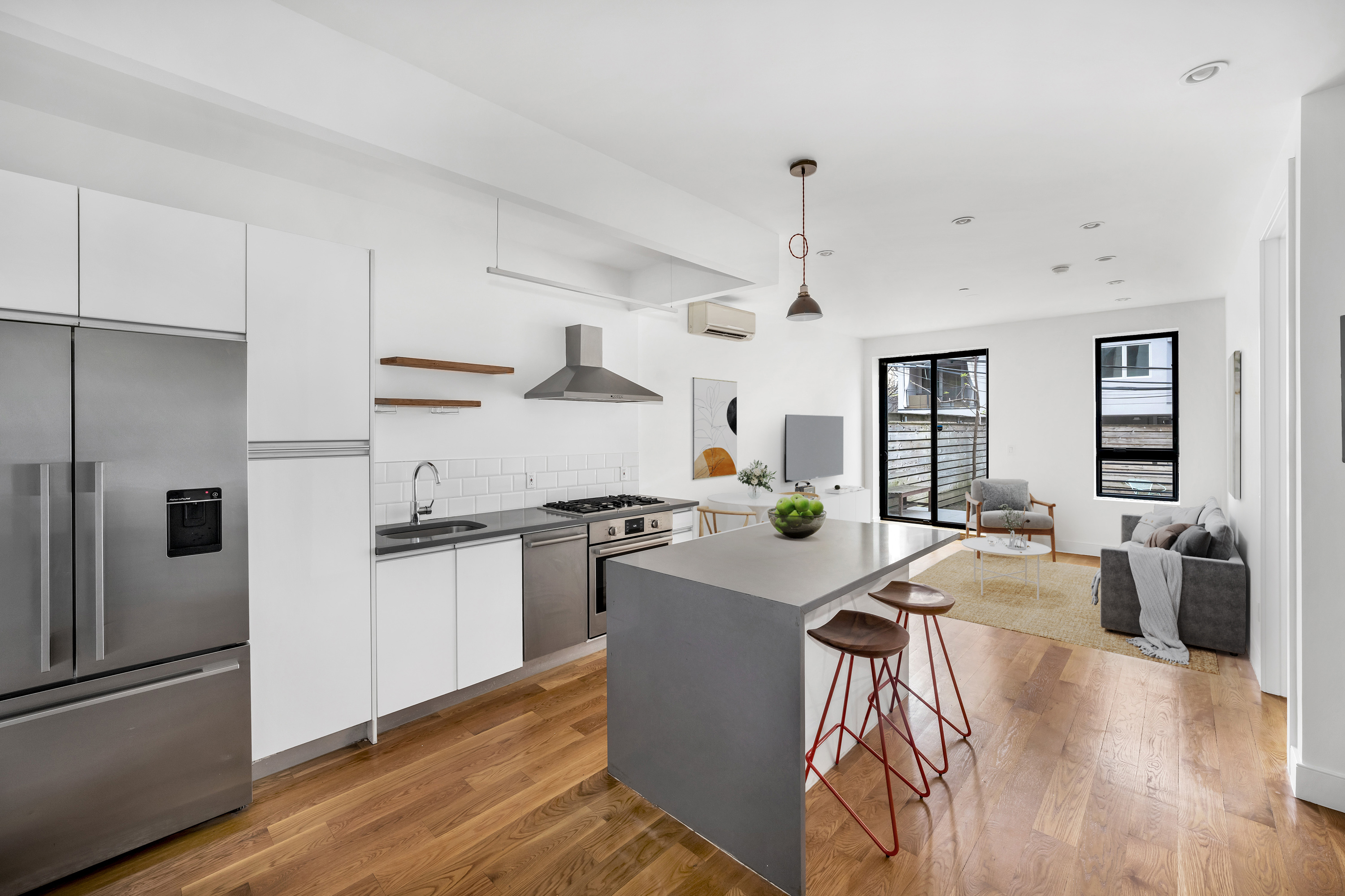 79 Clay Street, Unit 1R Brooklyn, NY 11222 - Photo 2 of 10 a kitchen with sink refrigerator and wooden floor