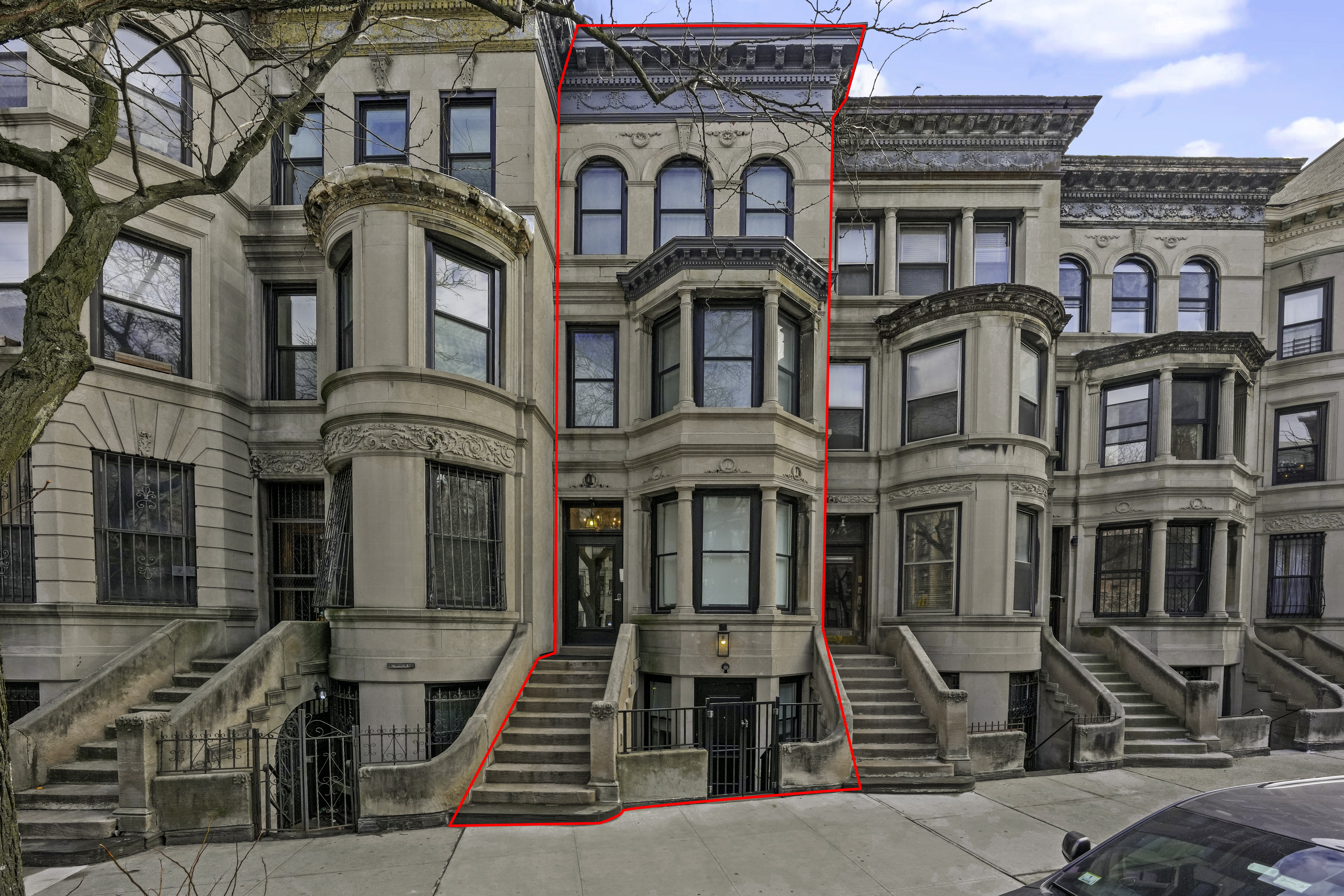 950 St Nicholas Avenue, Unit 1 Manhattan, NY 10032 - Photo 15 of 16 a front view of a building with many windows