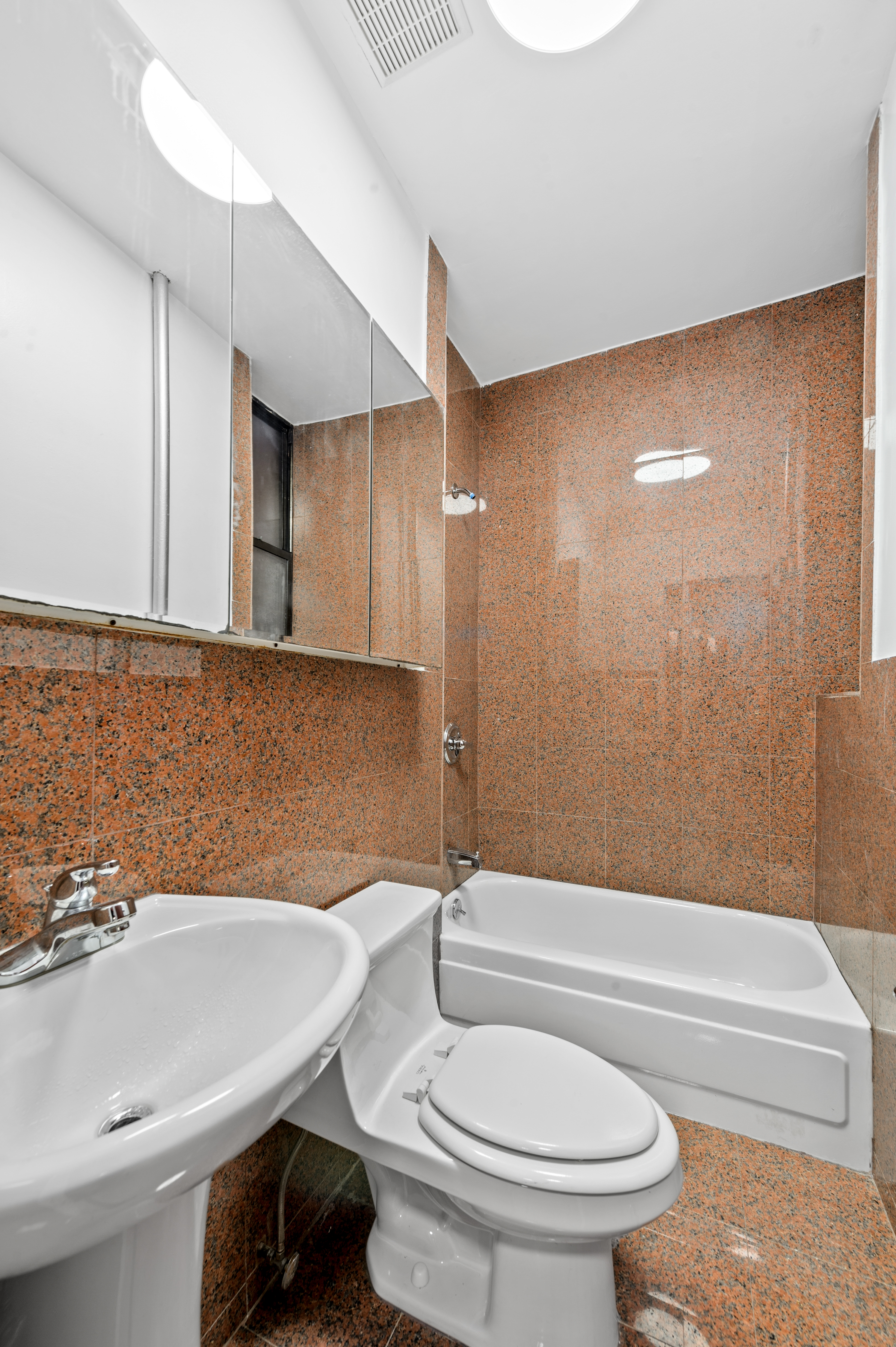 144 West 109th Street, Unit 1W Manhattan, NY 10025 - Photo 5 of 5 a bathroom with a sink a toilet and bathtub