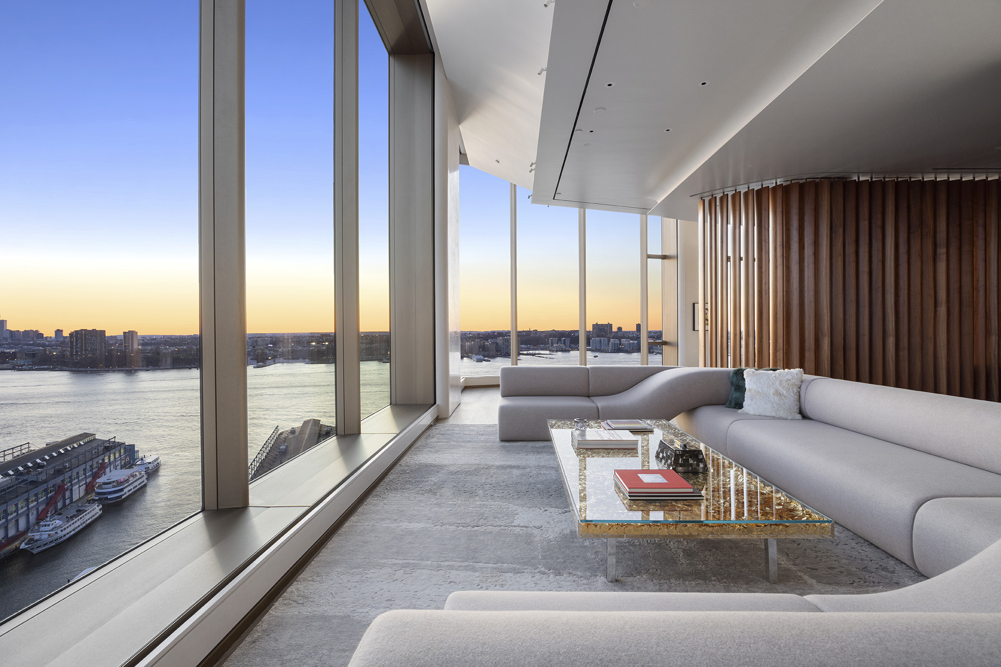 551 West 21st Street, Unit PH Manhattan, NY 10011 - Photo 2 of 51 a living room with furniture and a large window