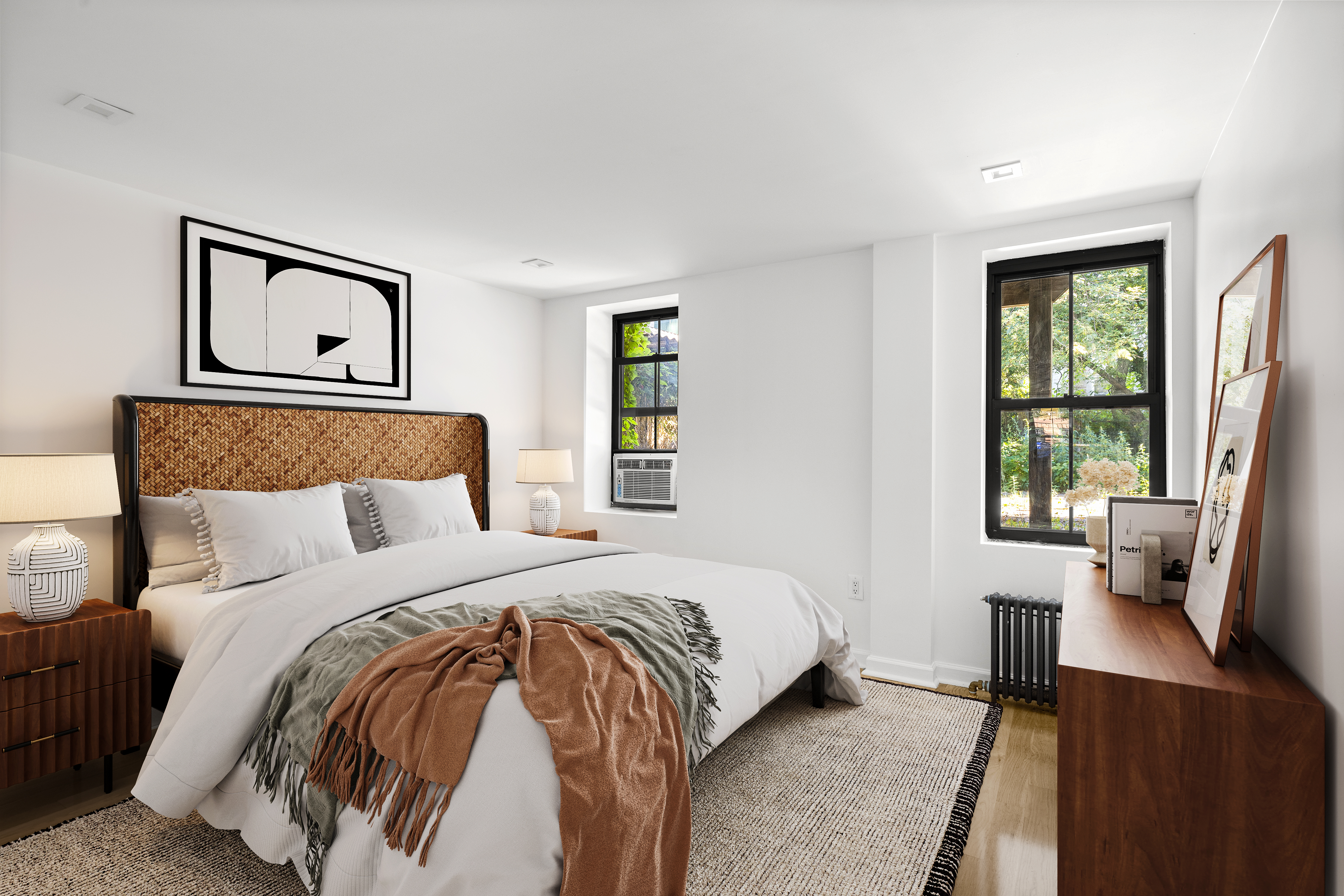 394 Decatur Street, Unit GARDEN Brooklyn, NY 11233 - Photo 3 of 7 a bedroom with a large bed and a window