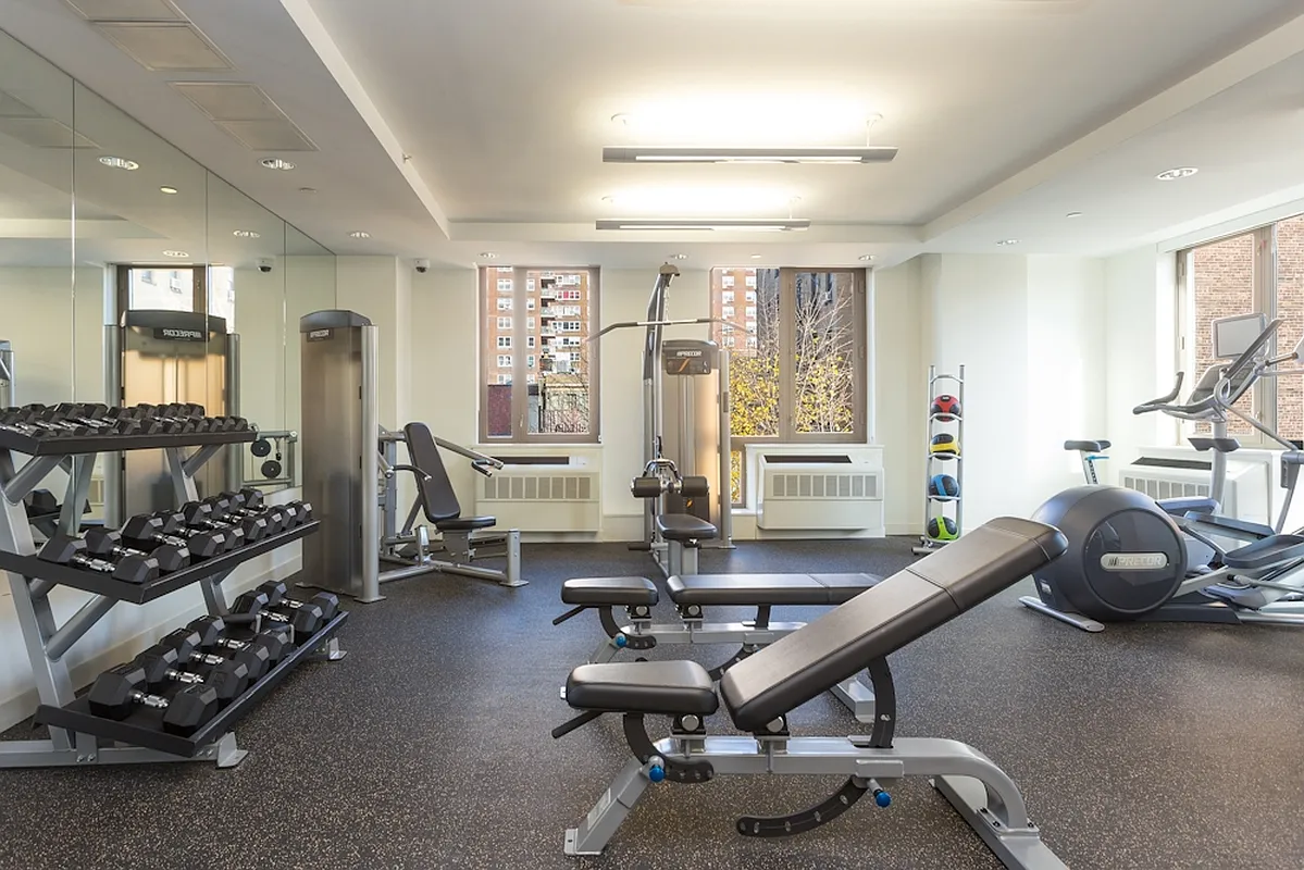 626 Flatbush Avenue, Unit 9H Brooklyn, NY 11225 - Photo 7 of 18 a room with gym equipment and a large window