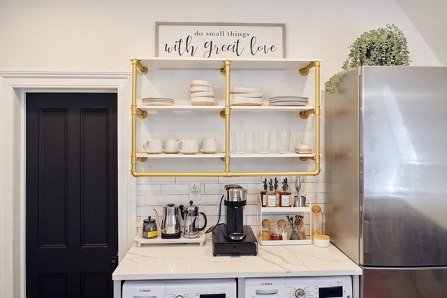 331 Highland Boulevard, Unit 2 Brooklyn, NY 11207 - Photo 3 of 6 a kitchen with a refrigerator and cabinets