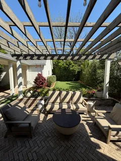 a view of a swimming pool with a patio