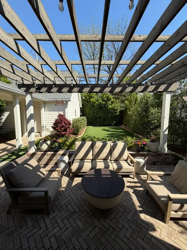 a view of a swimming pool with a patio